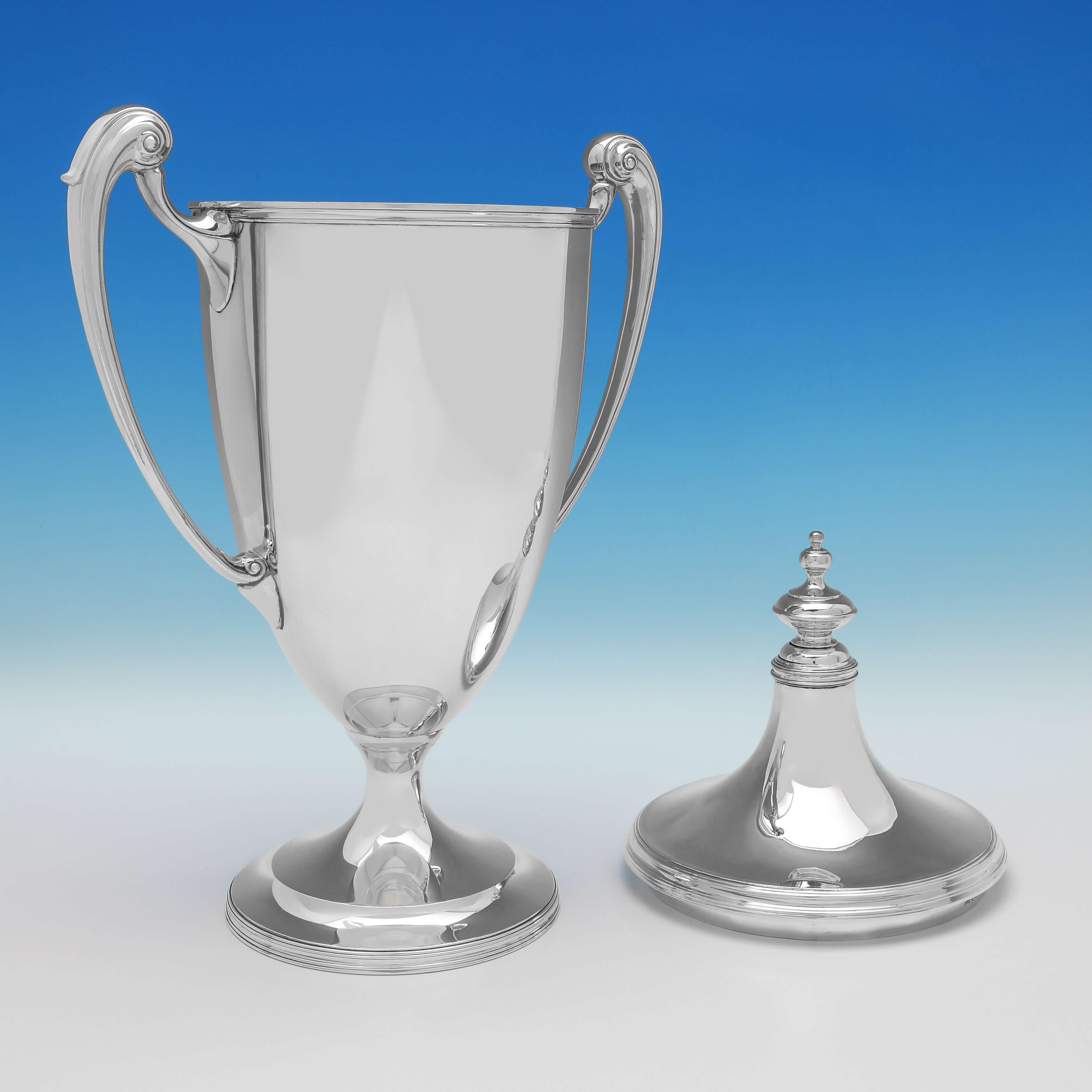Hallmarked in Sheffield in 1935 by Mappin & Webb, this handsome, sterling silver trophy, is classical in shape, and features acanthus detailing to the handles, and reed borders. The trophy measures 20