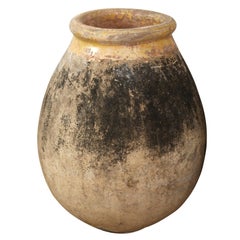 A Large Terracotta Olive Jar From France