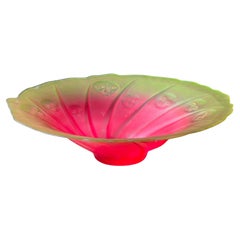 A large unique depression glass platter with moon faces, early 20th century