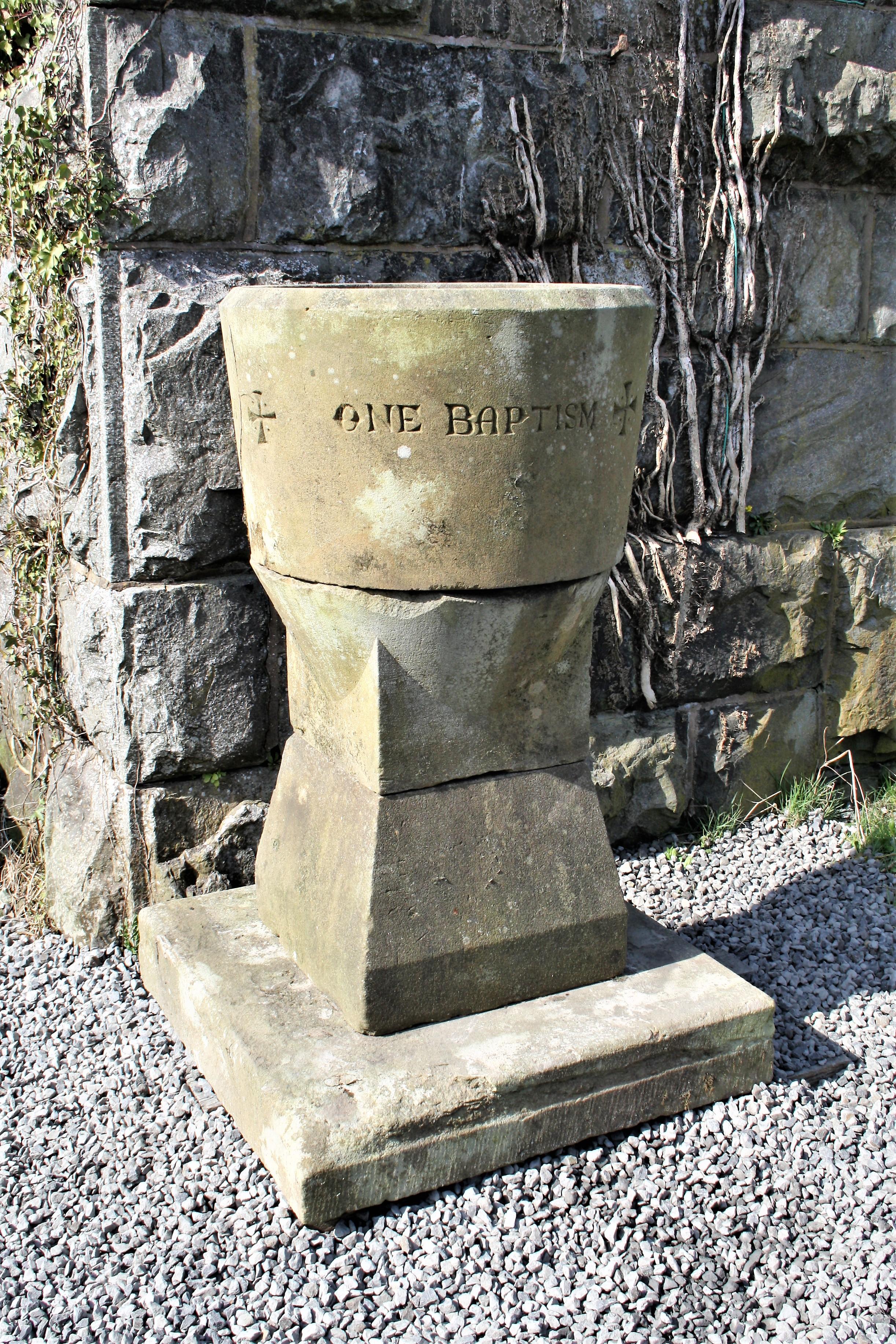 A genuine reclaimed church font from a small welsh parish in mid-wales. Dating to 1863 when St Johns Church, Llanbrynmair was built, this original sandstone font stands at nearly 6ft tall and is of substantial proportions. Sitting on a large square