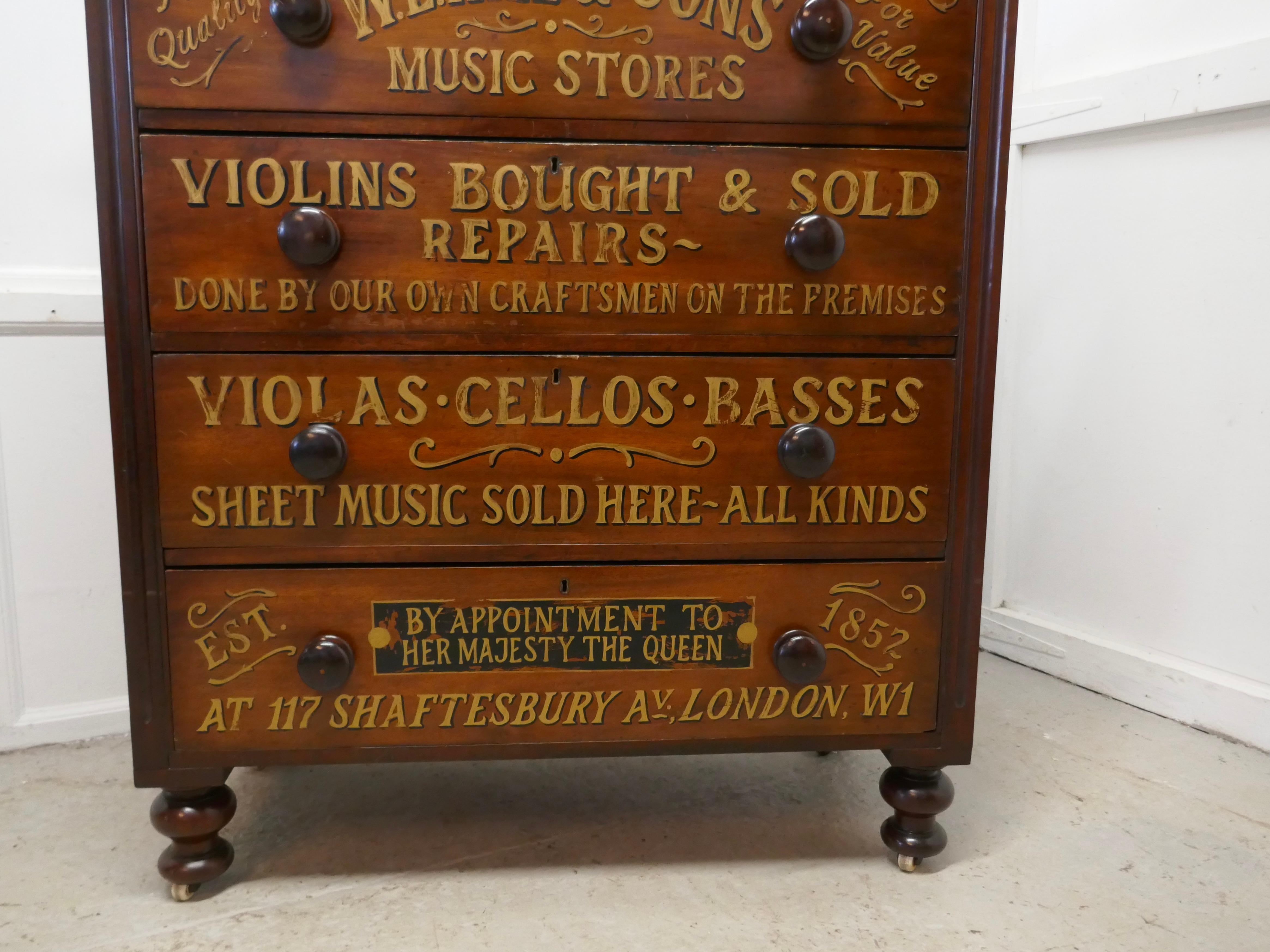 A large Victorian mahogany shop display music cabinet

A stunning and rare piece, this large chest is set on casters, it is a very heavy piece but moveable
On the front he cabinet was painted for W.E.Hill & Sons, it has large turned wooden knobs,