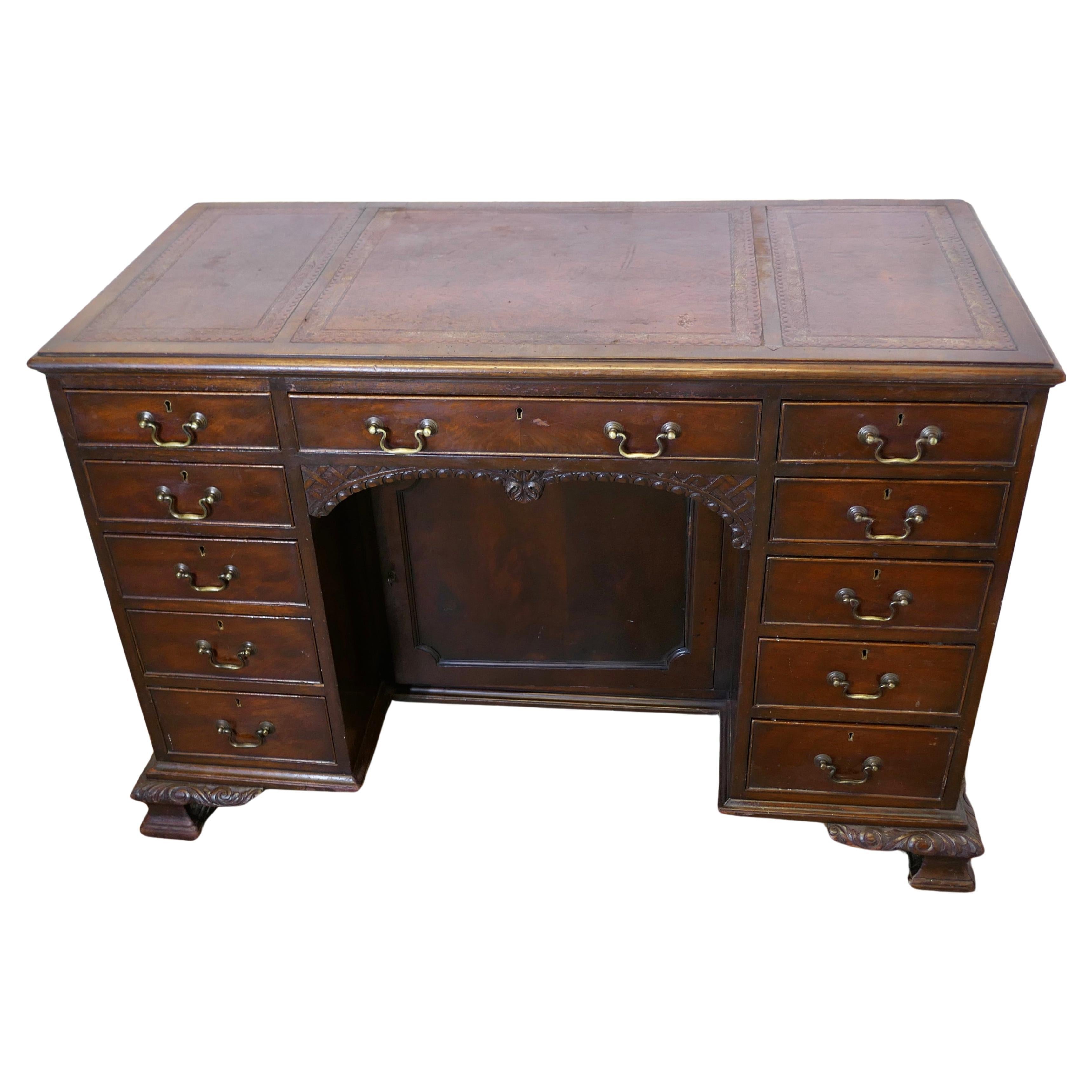 A Large Victorian Walnut Knee Hole Desk