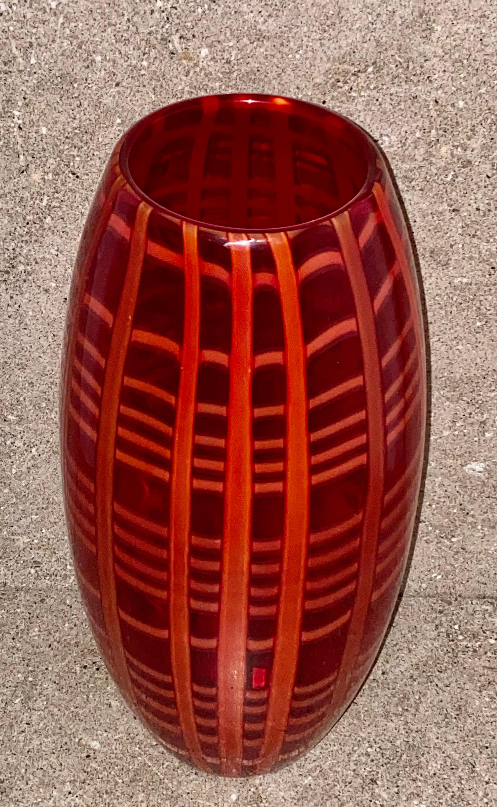 Vase designed and executed by Cenedese from the year 2002 _ 2005 
This large red crystal glass vase with fused wide light red glass bands. This vase was made only for the fashion house 