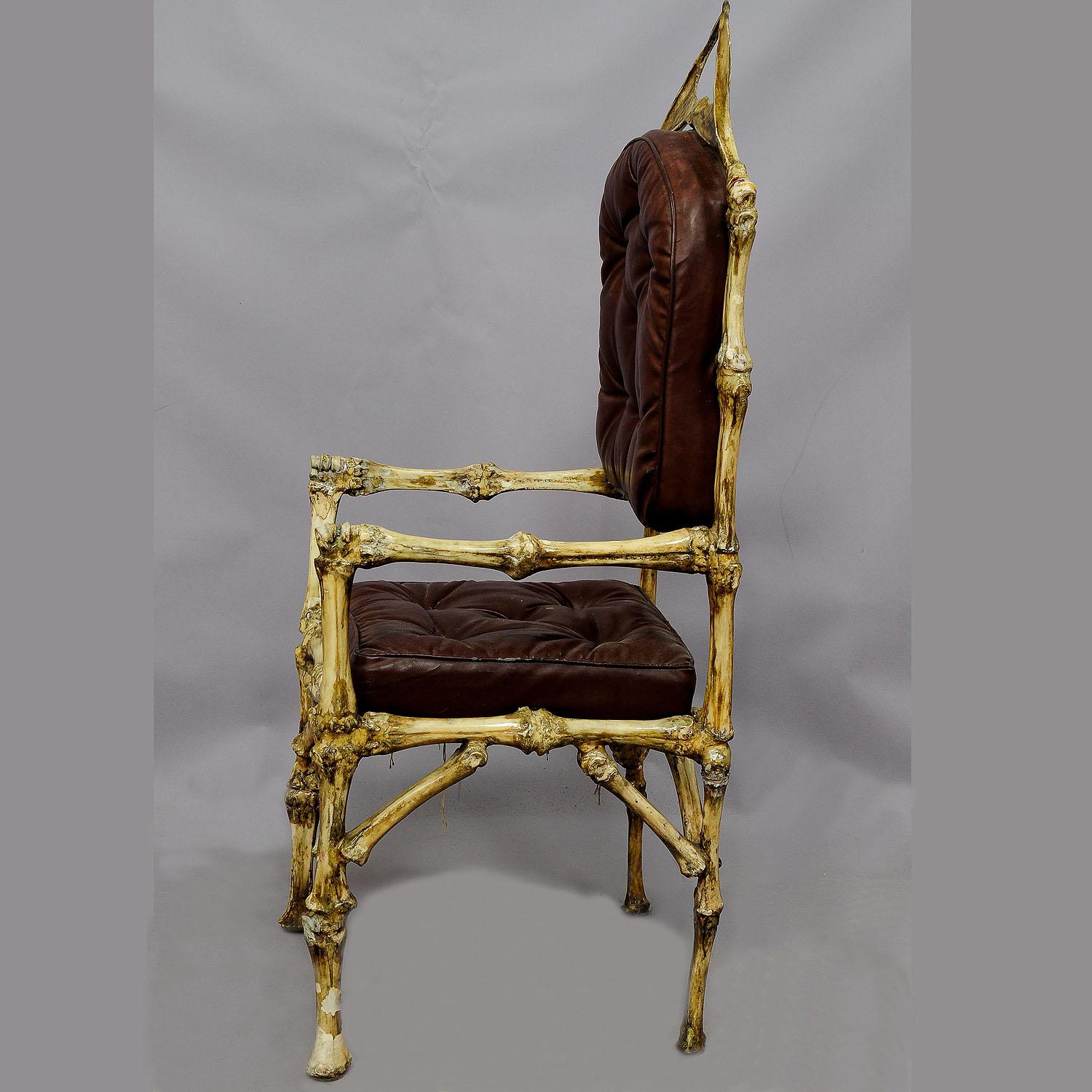 A great piece of fantasy furniture - a throne chair made of original bones from the female cattle (Bos taurus). All parts are made of real cattle bones sticked together with iron rods. The chair has hip bones on top of the backrest. It was