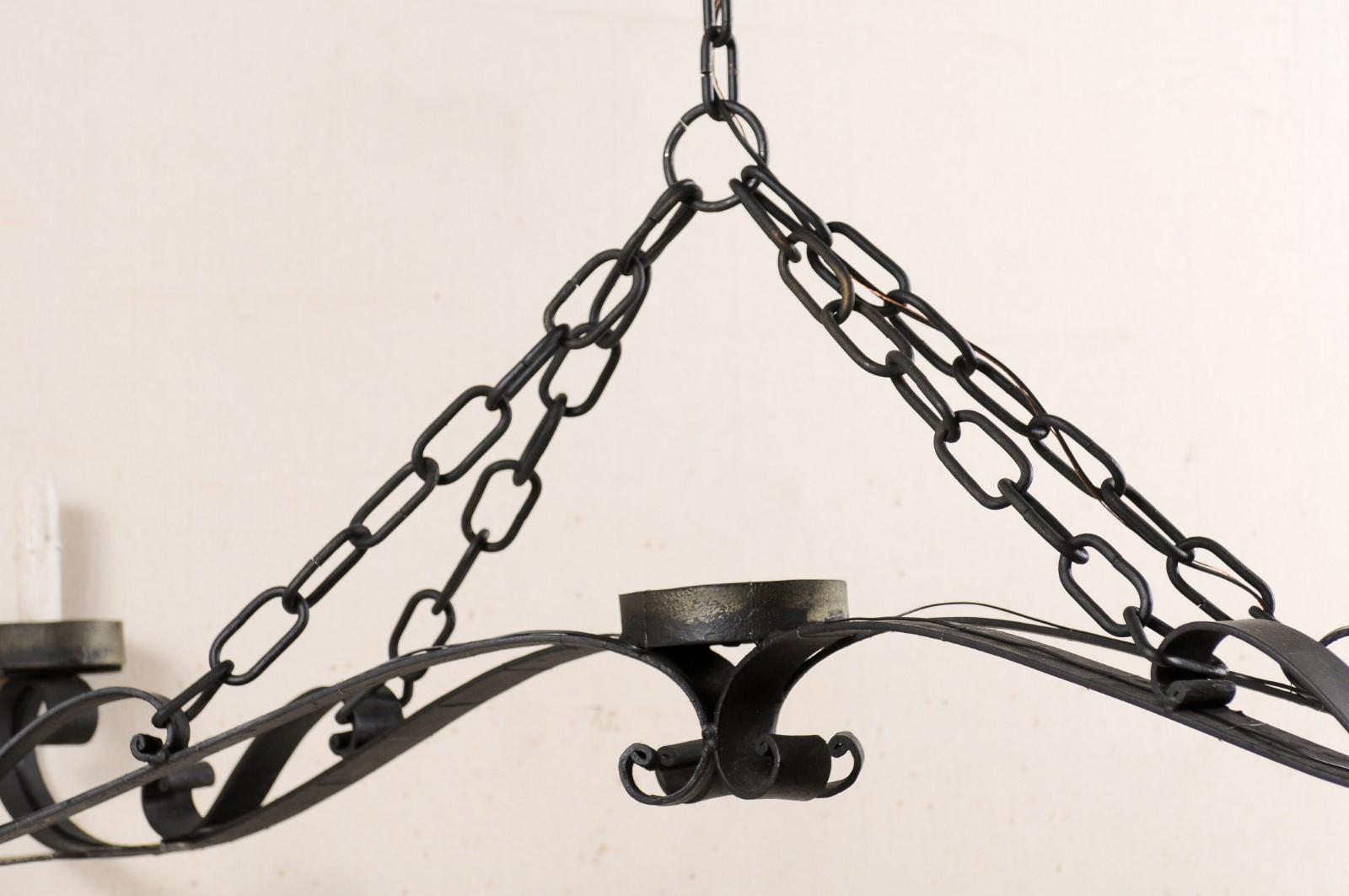 An Elegant French Wrought Iron Chandelier a Great Large Size of 5+ Ft in Length! In Good Condition In Atlanta, GA