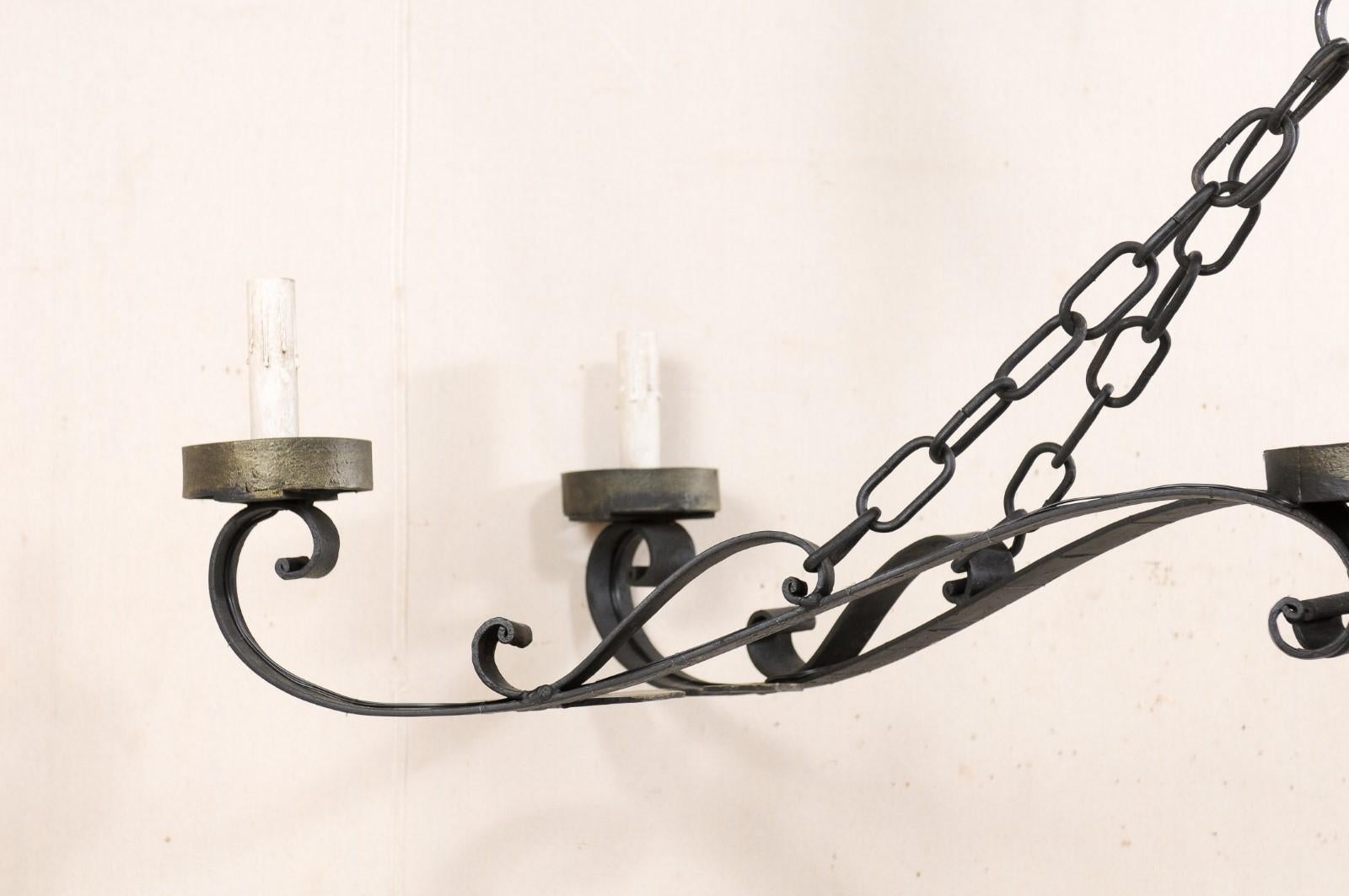 20th Century An Elegant French Wrought Iron Chandelier a Great Large Size of 5+ Ft in Length!