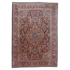 A Large Vintage Persian Sarouk Rug