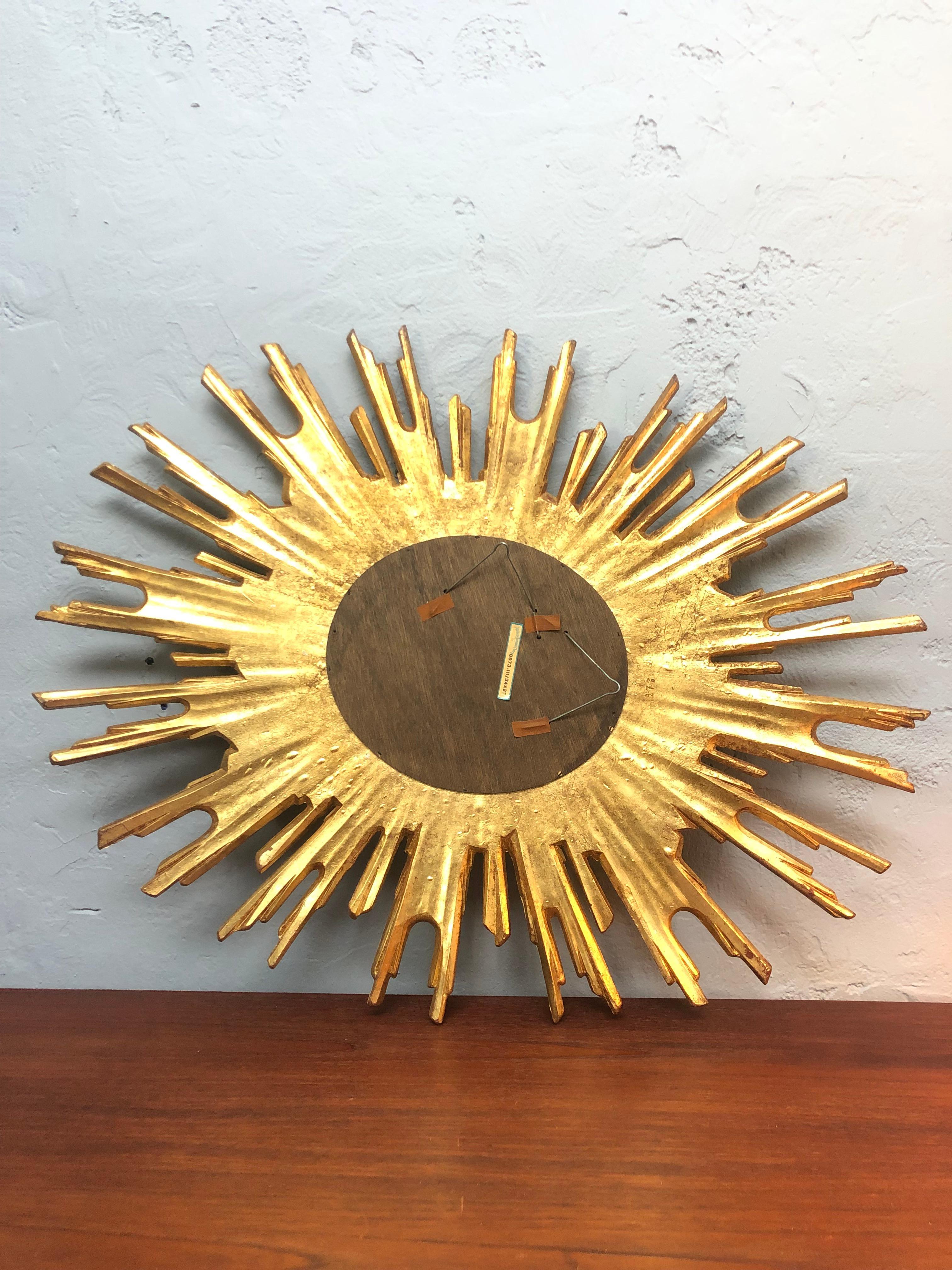 A Large Vintage Sunburst Mirror From Ateliers Armand Dutry Of Belgium  For Sale 1