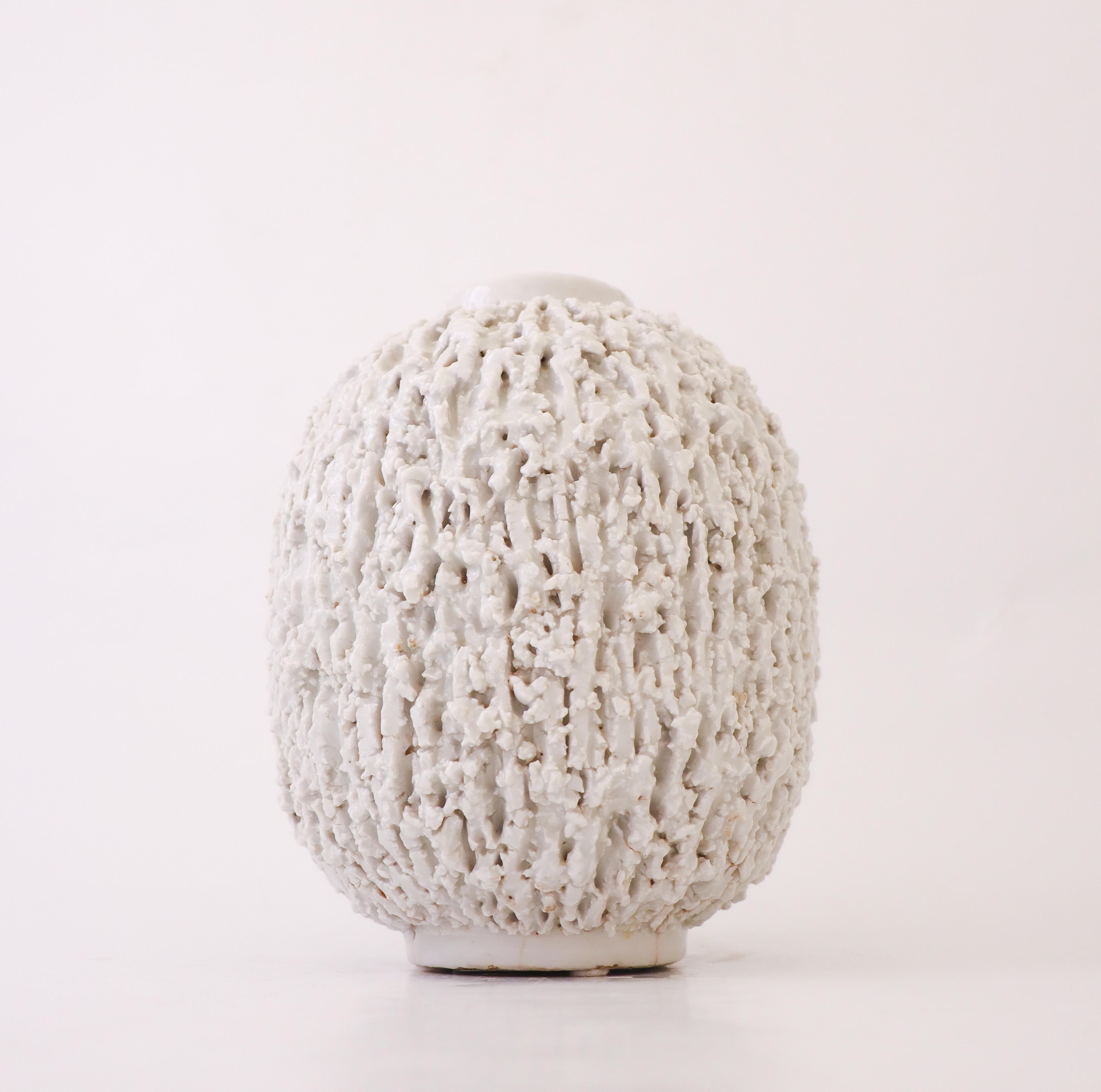 A large, white Hedgehog-vase designed by Gunnar Nylund at Rörstrand. It is 21 cm (8.4
