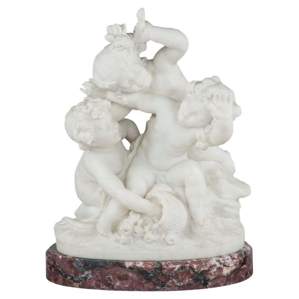 A large white marble figural group depicting three putti, Charles Raphaël Peyre For Sale