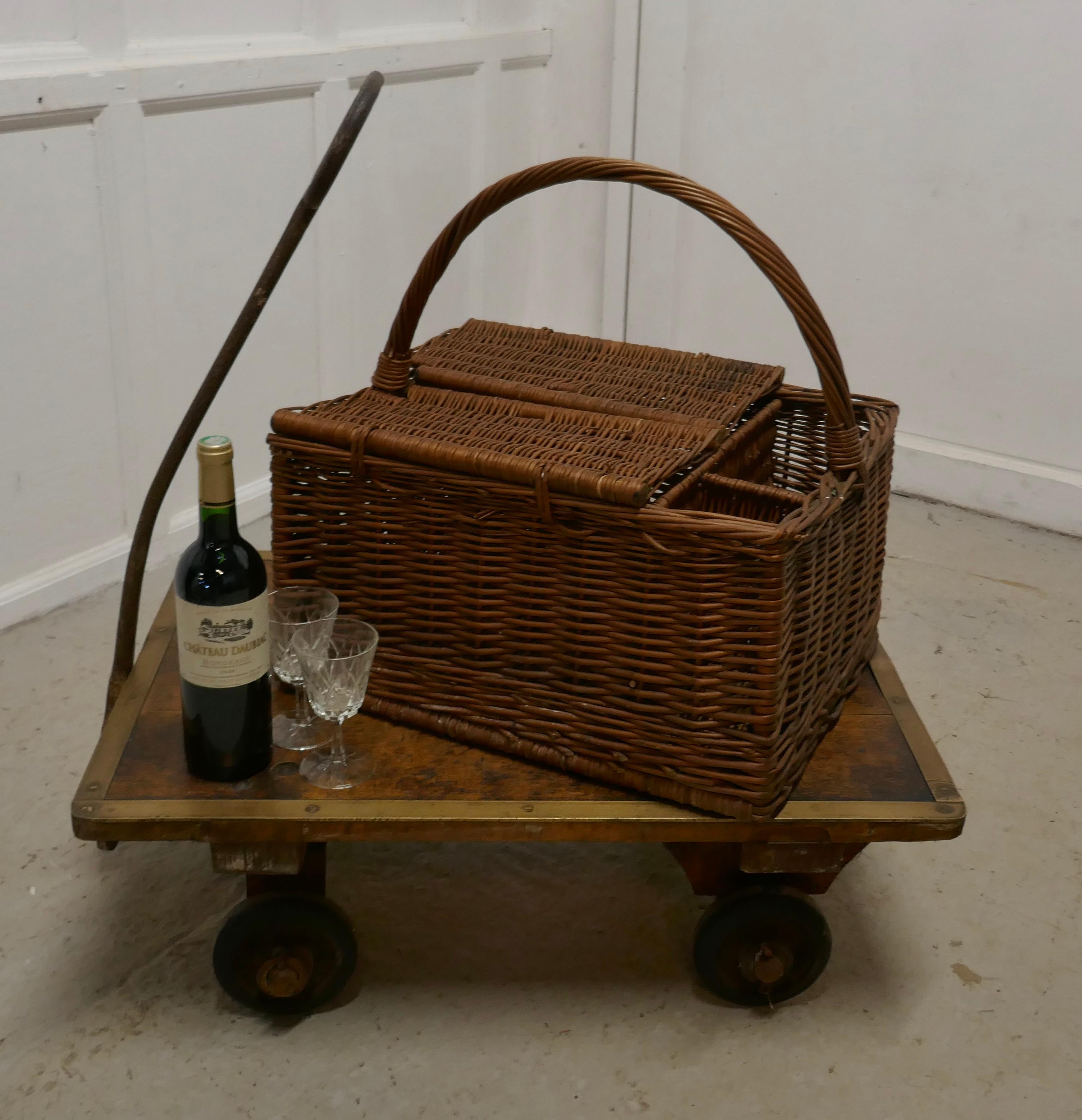 large wicker picnic basket with lid