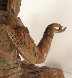 A large wood Buddha/Guanyin with traces of pigments Ming Dynasty (1368-1644)