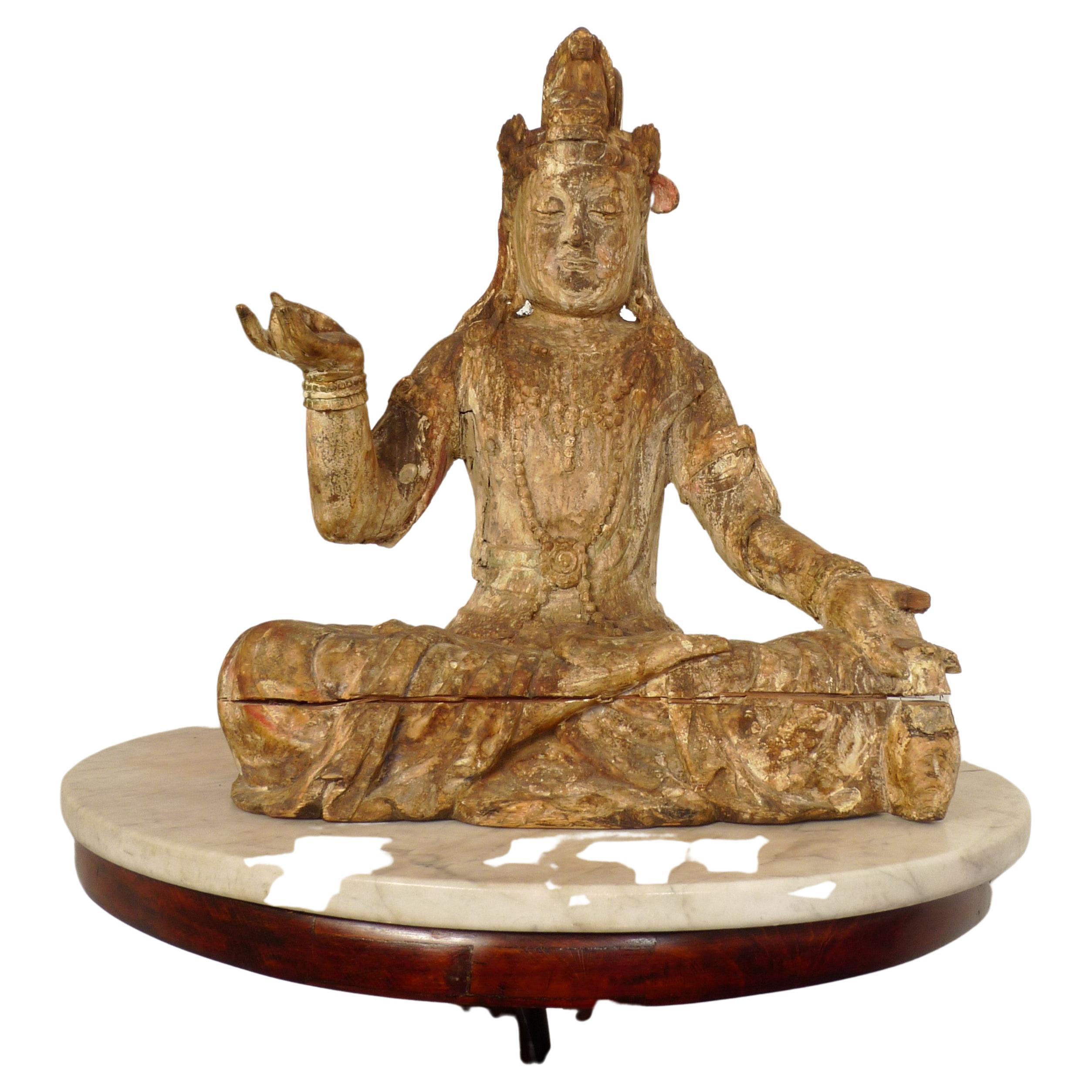 A large wood Buddha/Guanyin with traces of pigments Ming Dynasty (1368-1644) For Sale