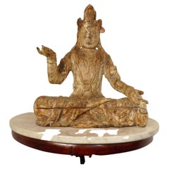 A large wood Buddha/Guanyin with traces of pigments Ming Dynasty (1368-1644)