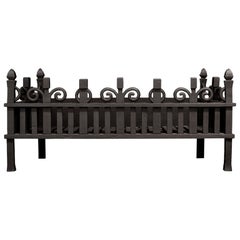A Large Wrought Iron Fire Basket in the Arts and Crafts Style