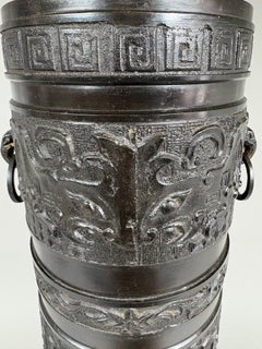 A largeJames Mont Style Chinese-form brass lamp with detached rings circa 1940