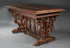 A late 16th century French Renaissance richly carved walnut center table