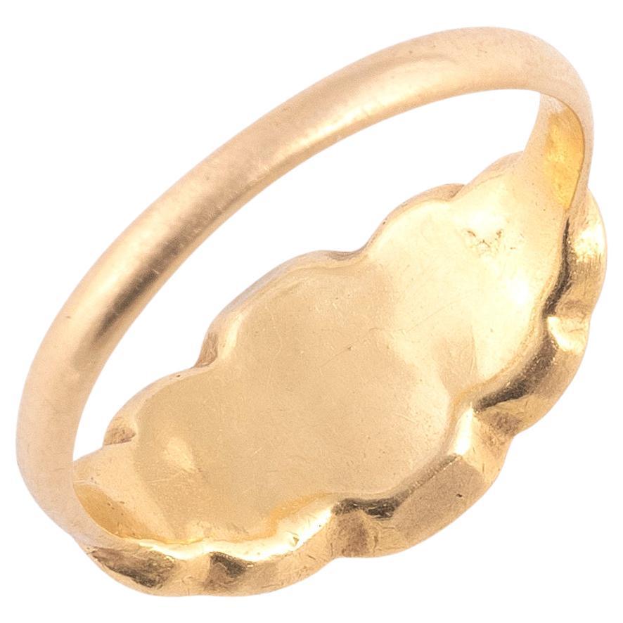 A Late 16th Century Renaissance Ring In Solid 22k Yellow Gold
Set with 8 table cut diamonds (approx. 1.5 ctw). The fine rub-over collets, boxed bezeling, largely unchanged from Late 16th c setting practice. 
Size : 5 1/4
Weight:2.79

Follow on