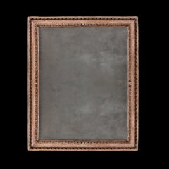 A Late 17th Century Italian Carved Pine Wood Wall Mirror