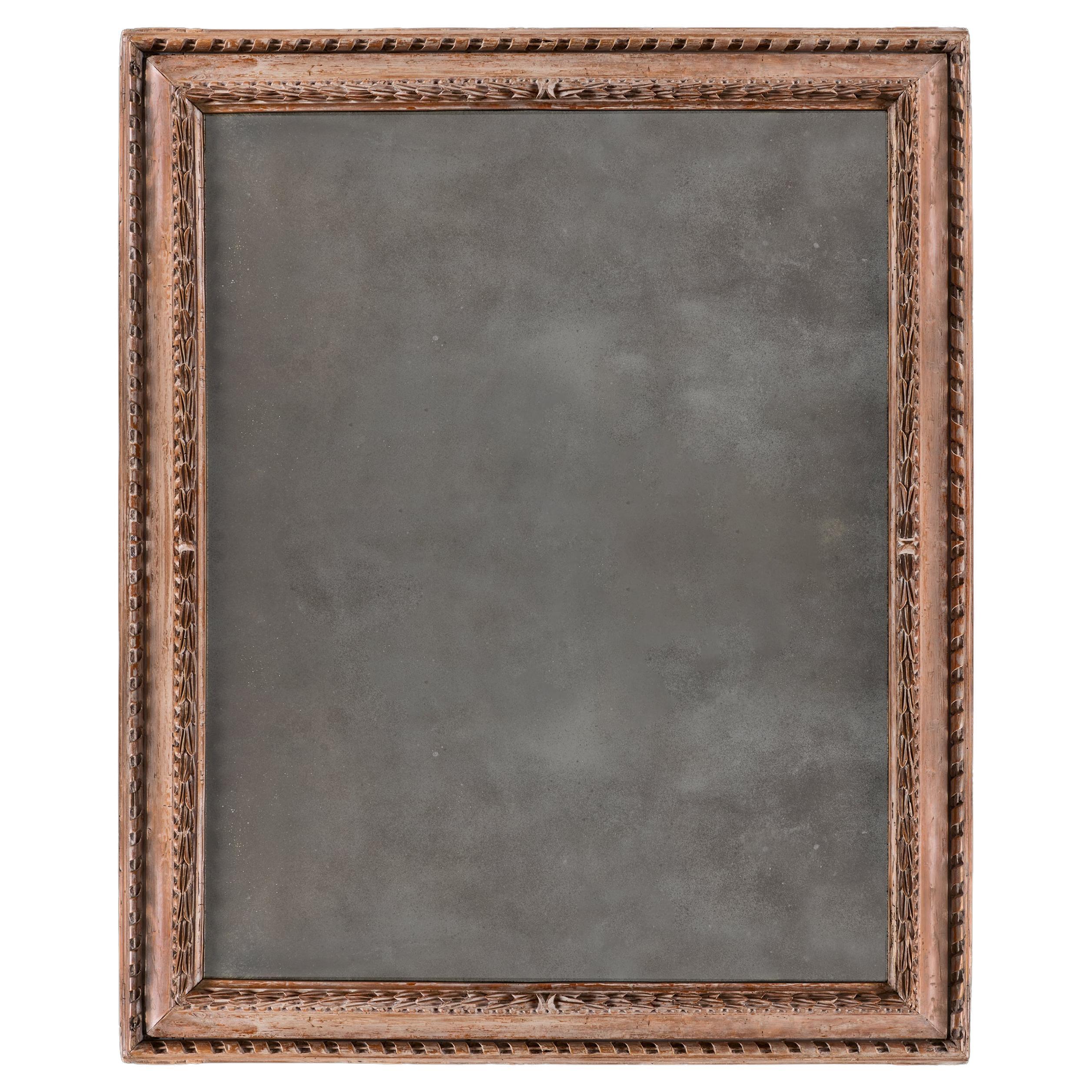 A Late 17th Century Italian Carved Pine Wood Wall Mirror