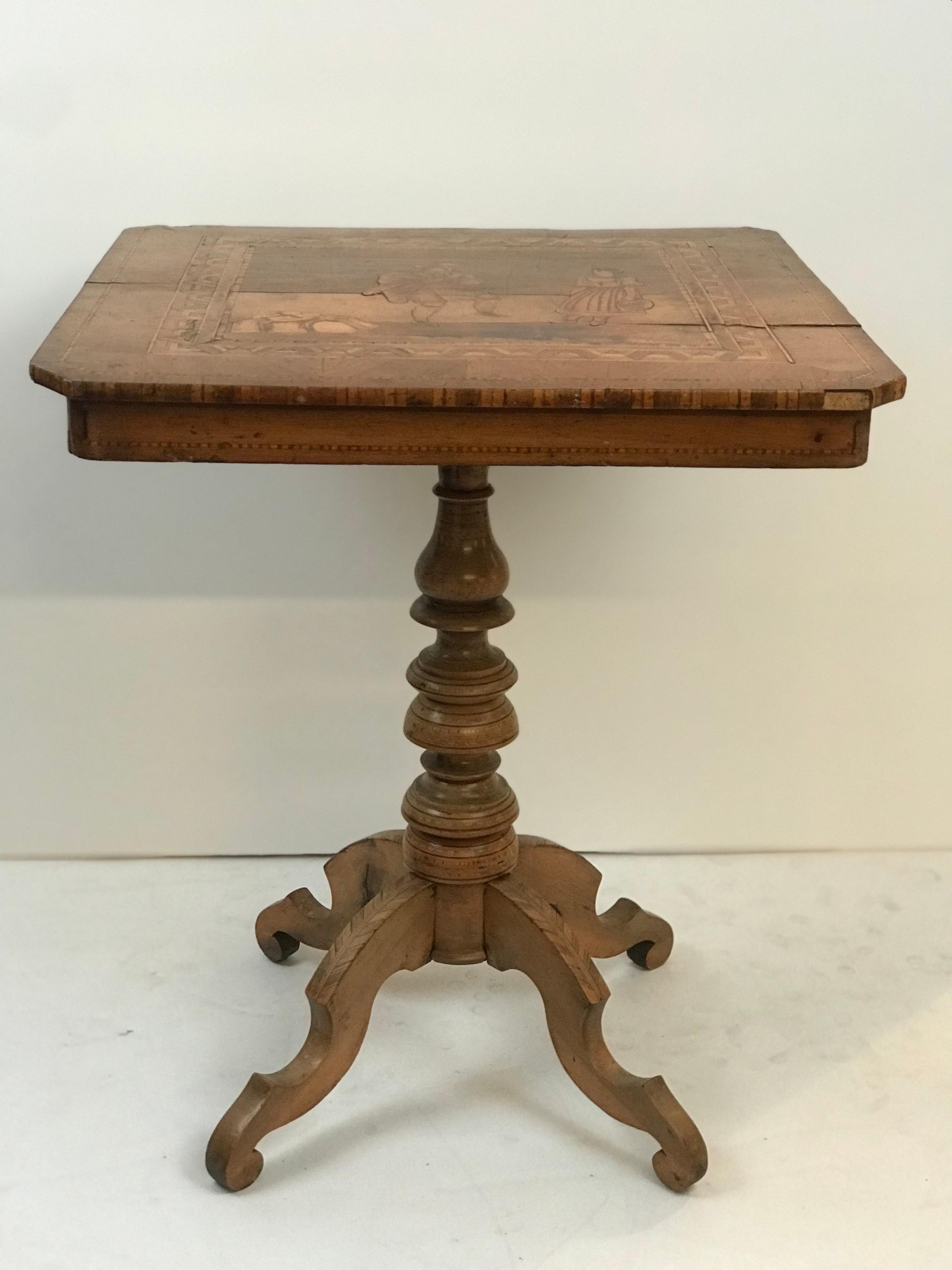 Fruitwood A Late 1800's Sorrento Marquetry Desert Table with Figural Classical Motif  For Sale