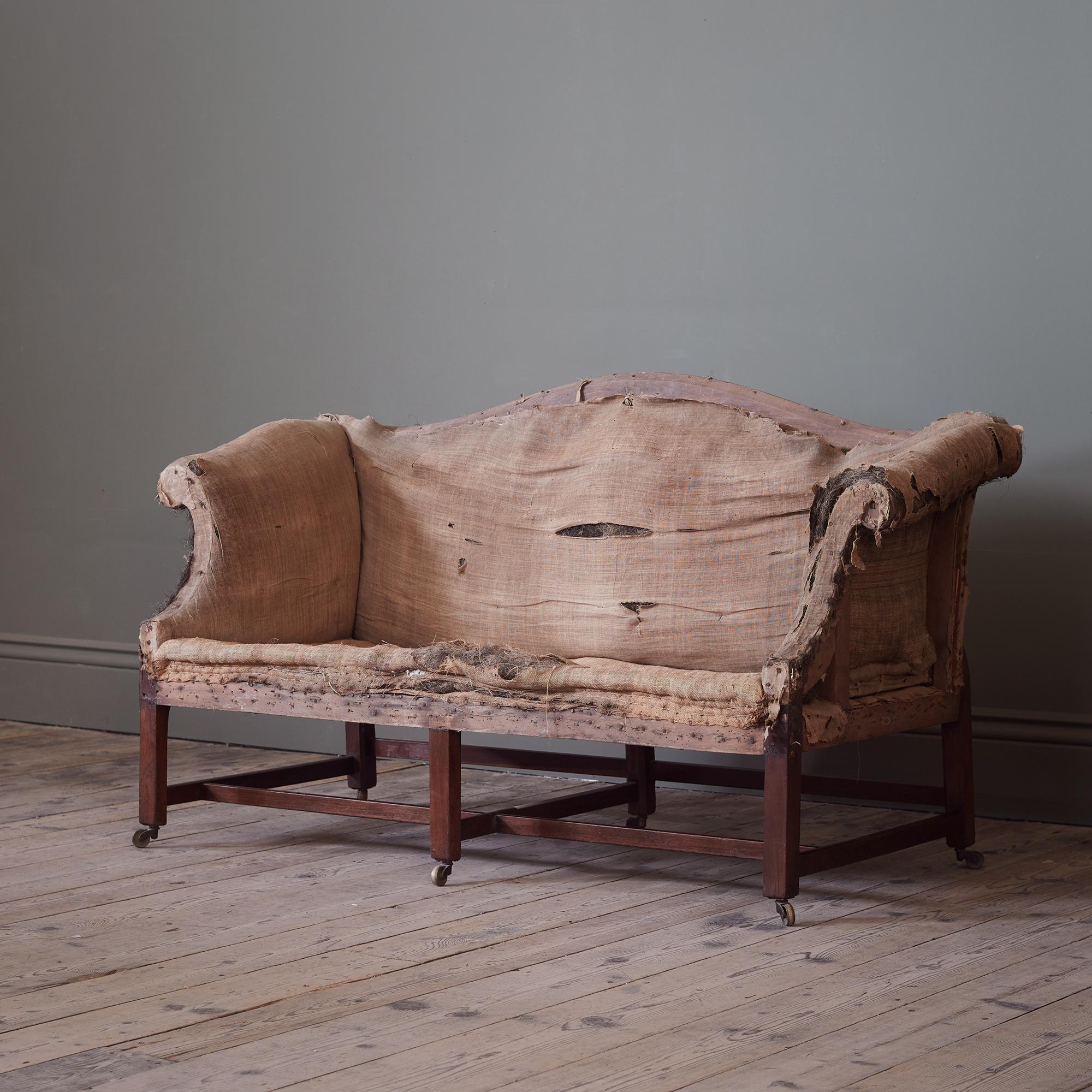 English A Late 18th Century Mahogany Camel Back Sofa, of Smaller Proportions For Sale