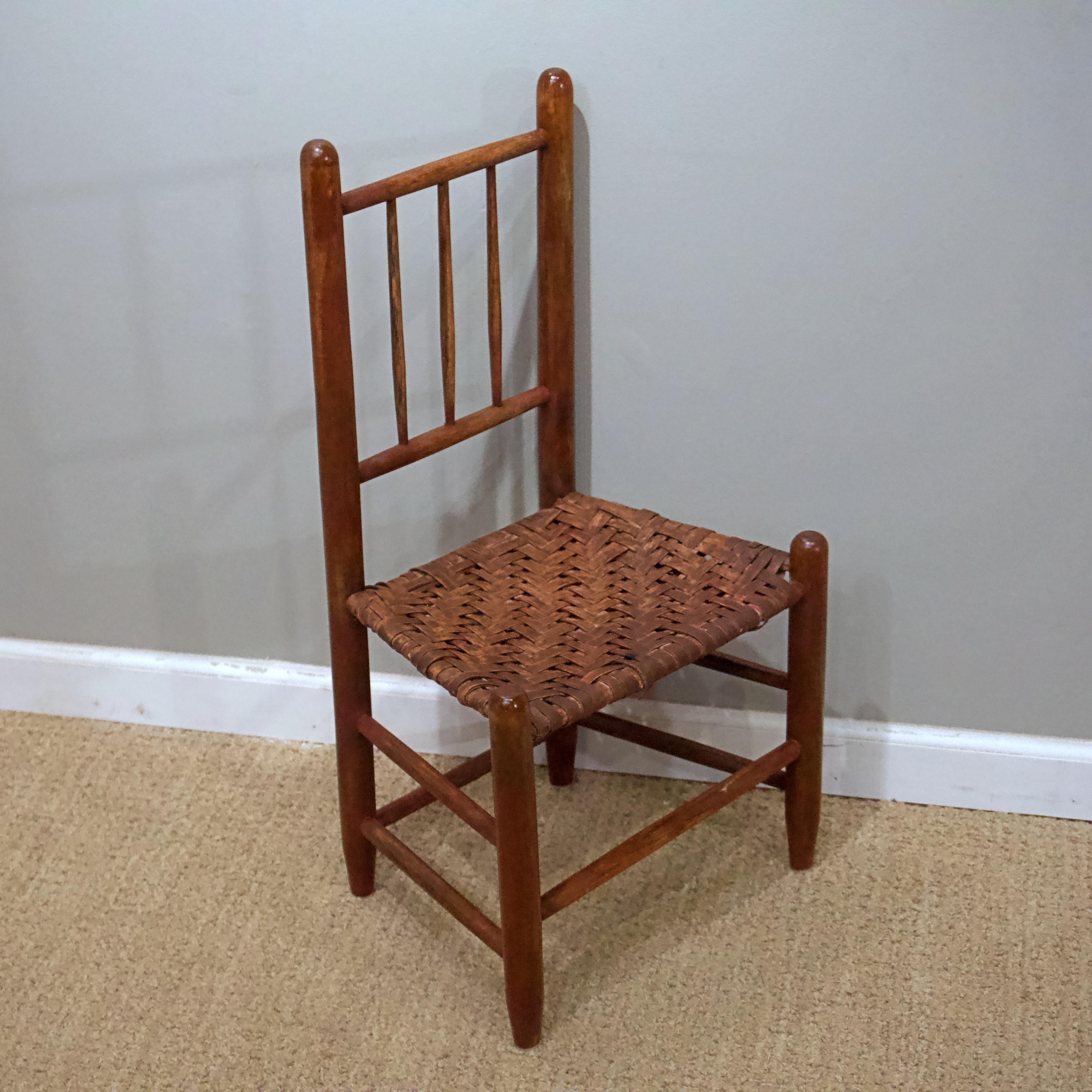 With flat reed or basket weave seat.