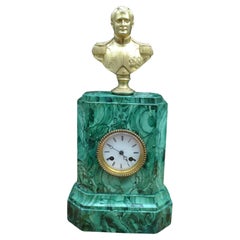 A Late 19 Century Malachite clock Topped by a Gilt  Bronze Bust of Napoleon