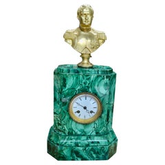 A Late 19 Century Malachite clock Topped by a Gilt  Bronze Bust of Napoleon