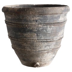 A late 19th C. Black Catalan Cosi Pot Wabi Sabi