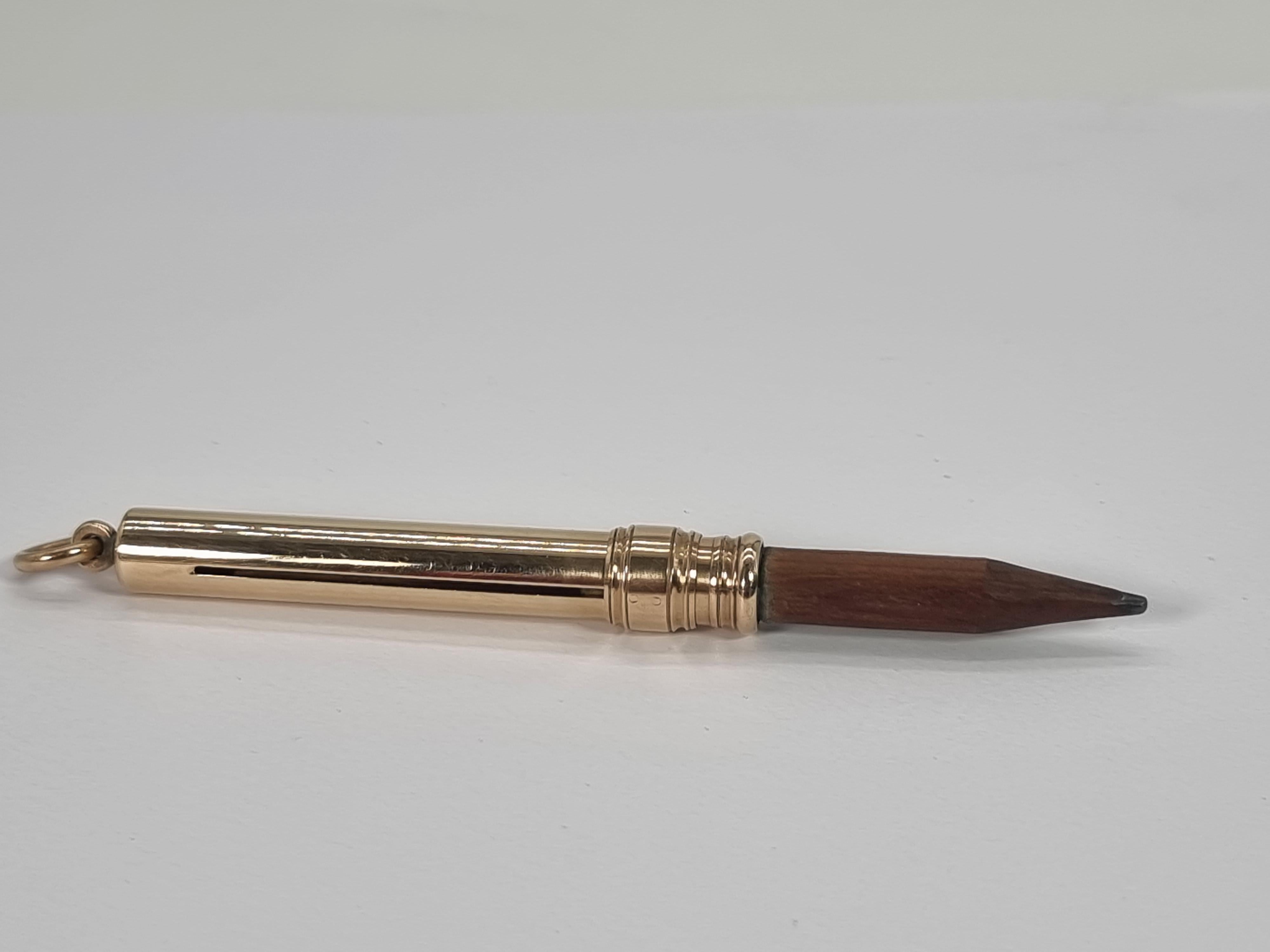 This very fine example of a gold sliding pencil was produced by the top English pen and pencil manufacturer Mordan and Co and bears their name on its stem with the factory arrow mark which indicates it is made from gold at least 10cts in