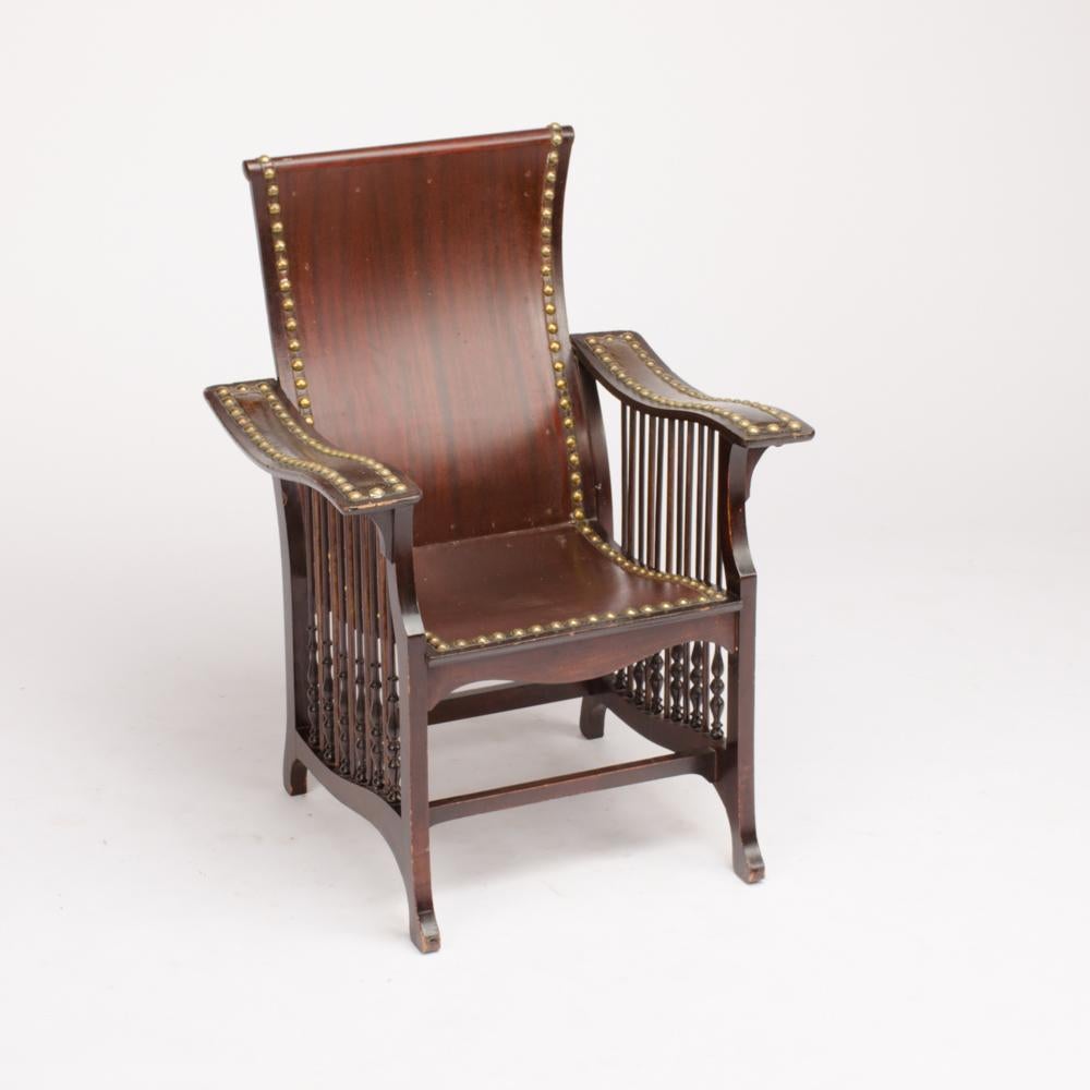 Aesthetic Movement Late 19th Century American Mahogany and Brass Library Armchair For Sale
