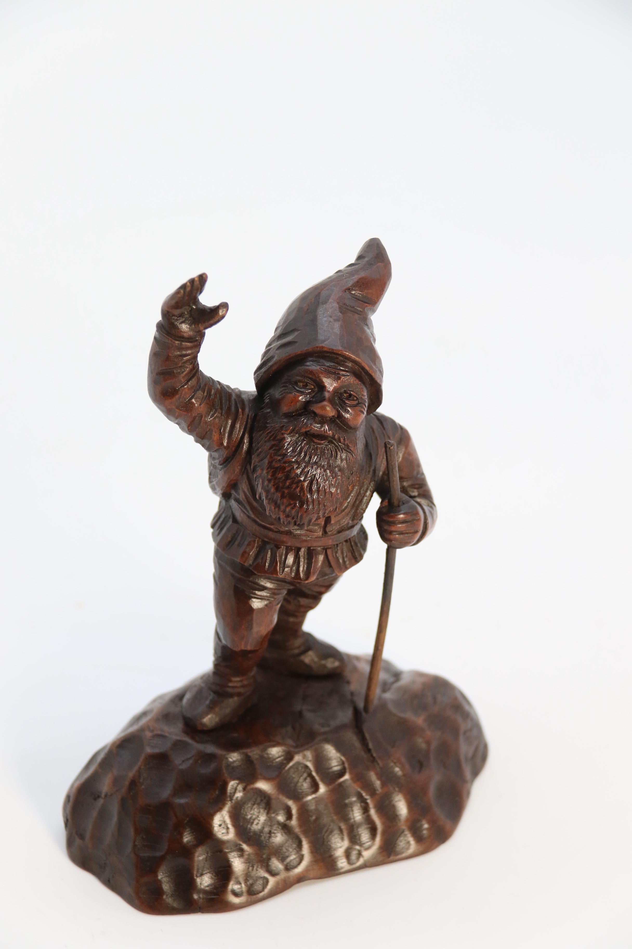 A late 19th century Black Forest carved walnut figure of a gnome circa 1900 3