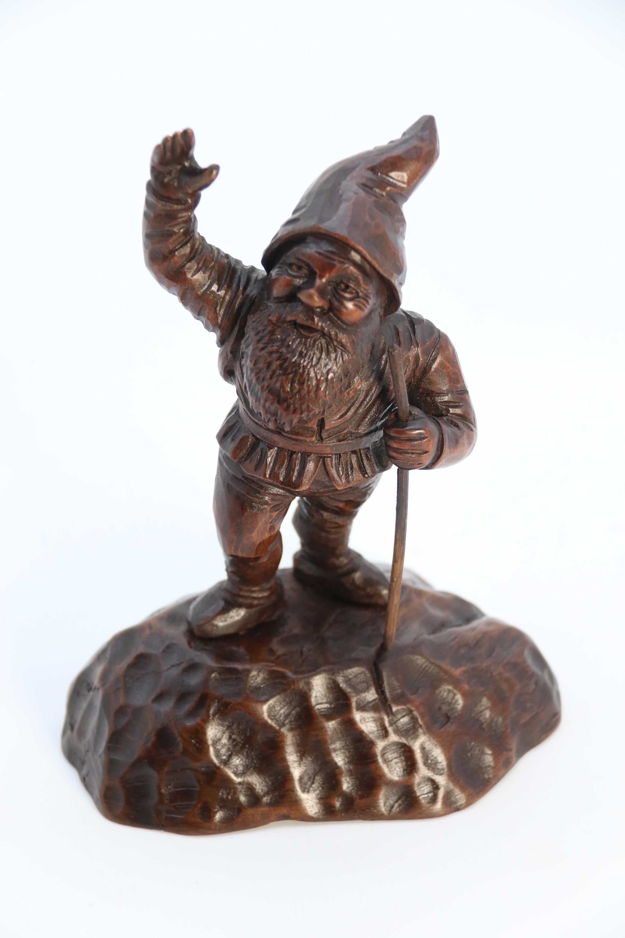A late 19th century Black Forest carved walnut figure of a gnome circa 1900 4