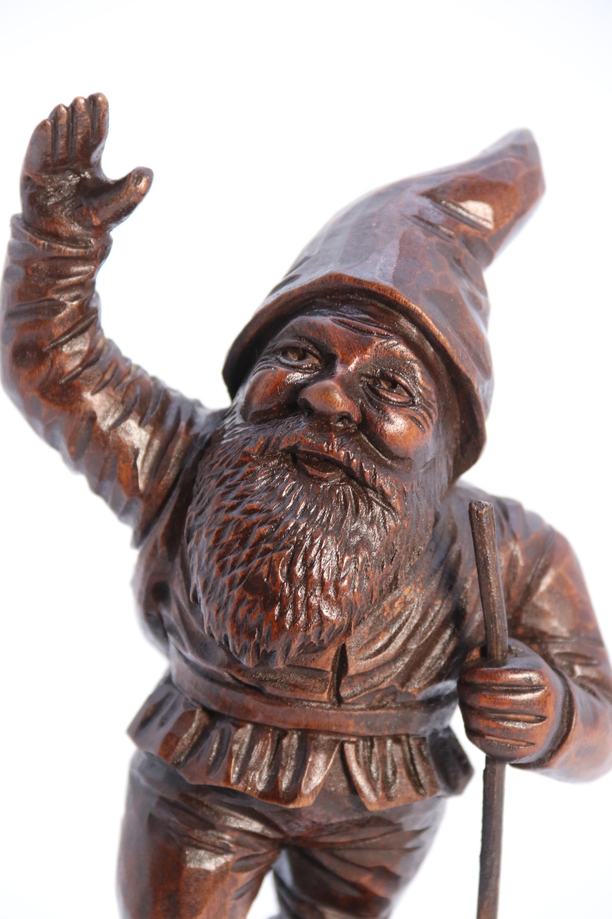A late 19th century Black Forest carved walnut figure of a gnome circa 1900 5