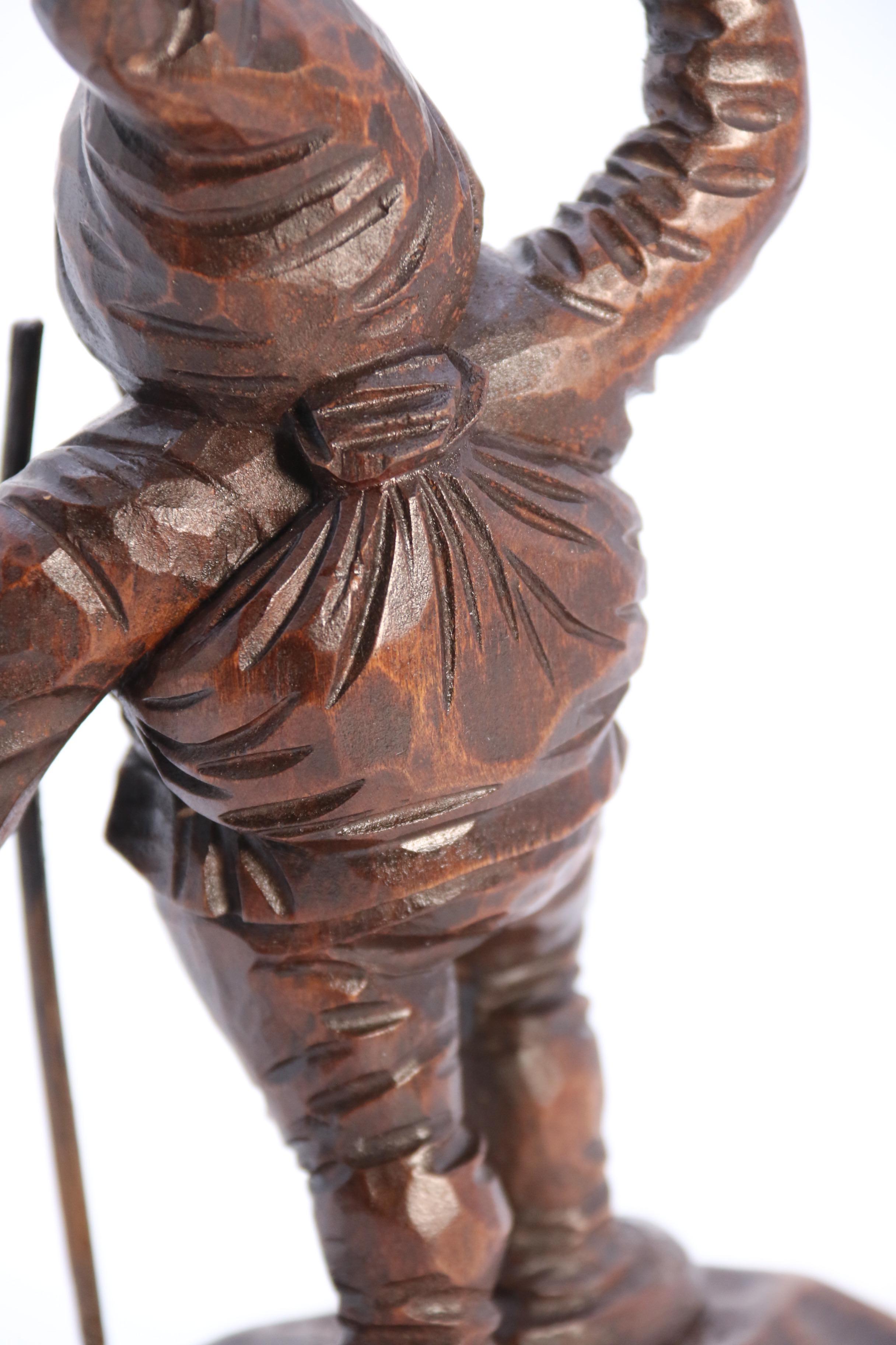 A late 19th century Black Forest carved walnut figure of a gnome circa 1900 6