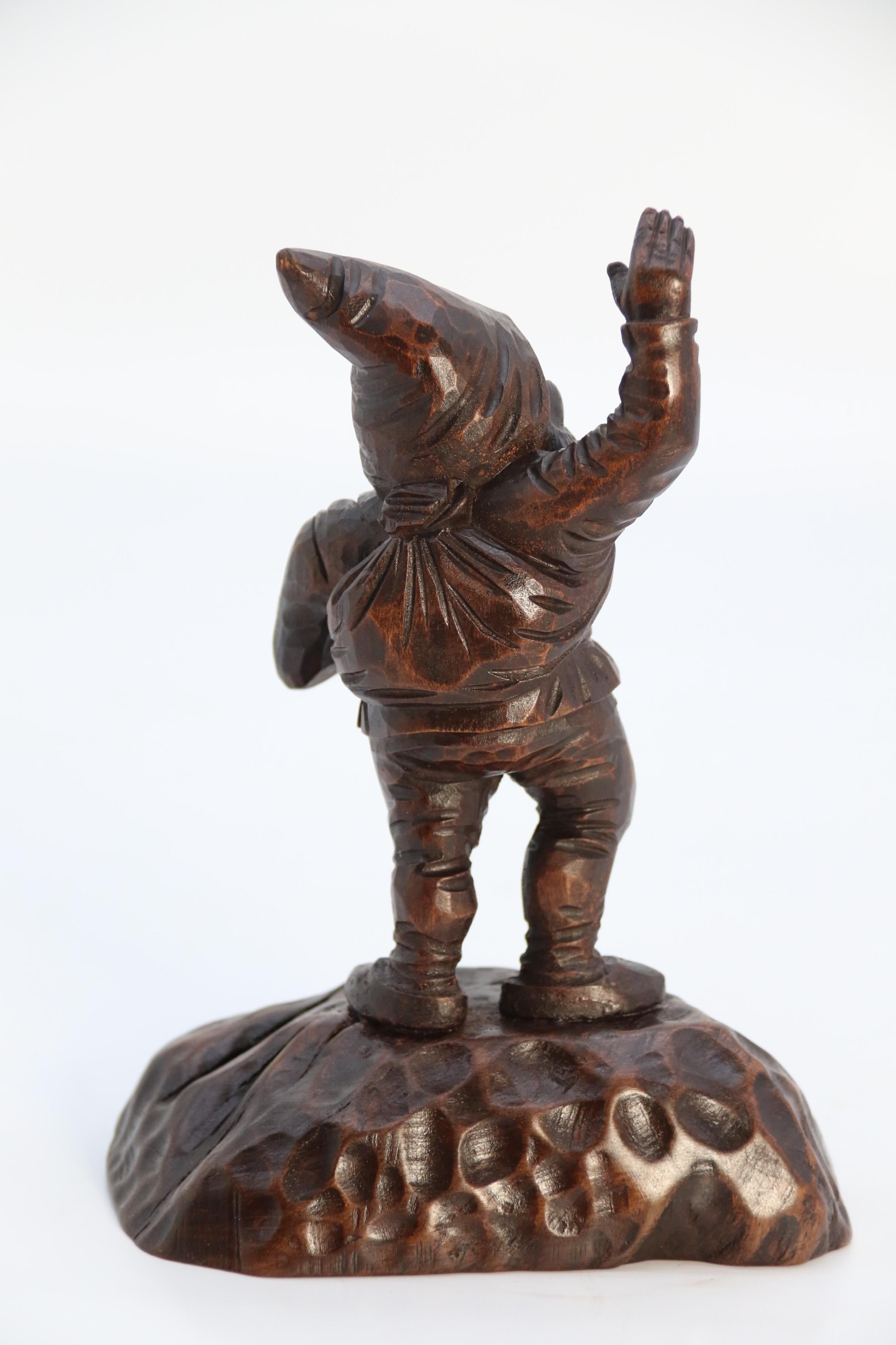 A late 19th century Black Forest carved walnut figure of a gnome circa 1900 In Good Condition In Central England, GB