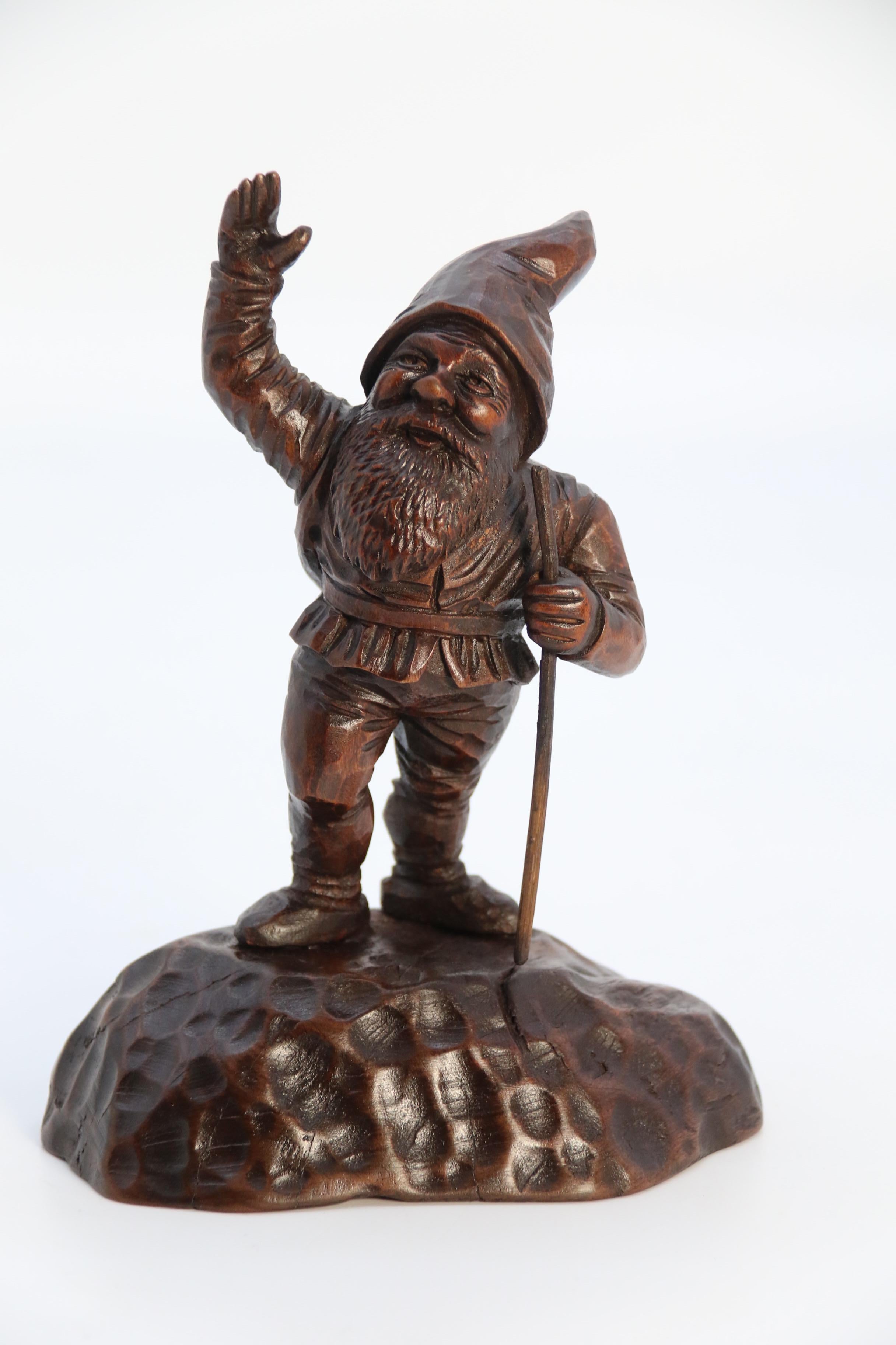 A late 19th century Black Forest carved walnut figure of a gnome circa 1900 1