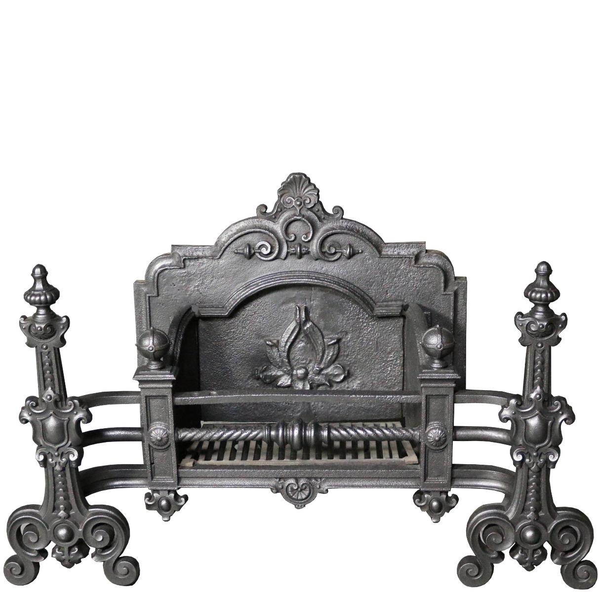 A late Victorian fire grate with shaped bars and urn finials.