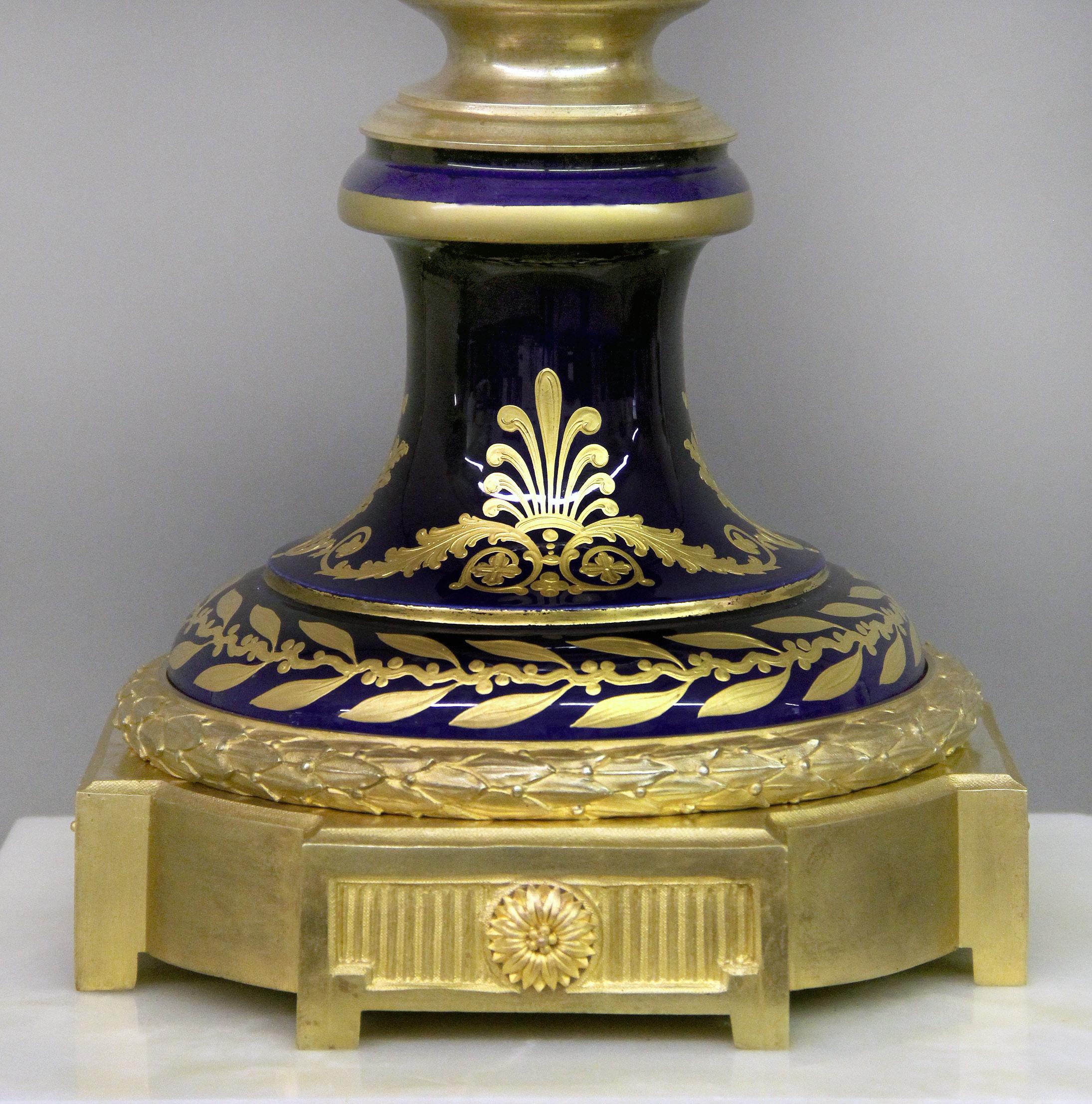 Late 19th Century Gilt Bronze Mounted Sèvres Style Napoleon Vase and Pedestal In Good Condition For Sale In New York, NY