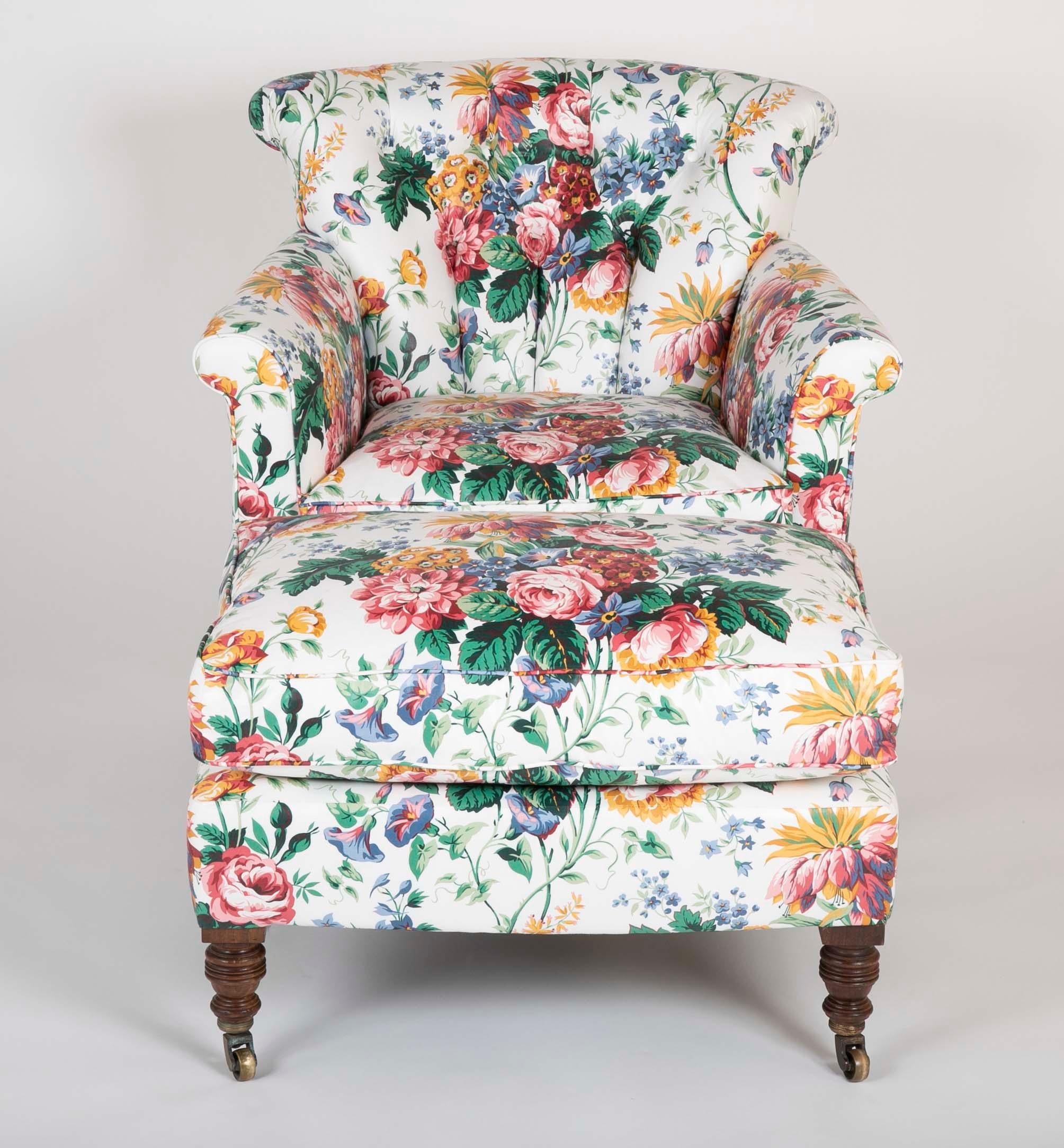 A newly upholstered Howard & Sons club chair in Chintz, We stamp 12666/9009 Howard and Sons Berners St chair. Measures: 30 1/2