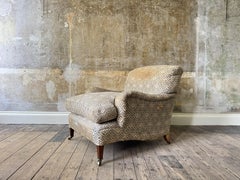 A late 19th Century Howard & Sons Harley Armchair