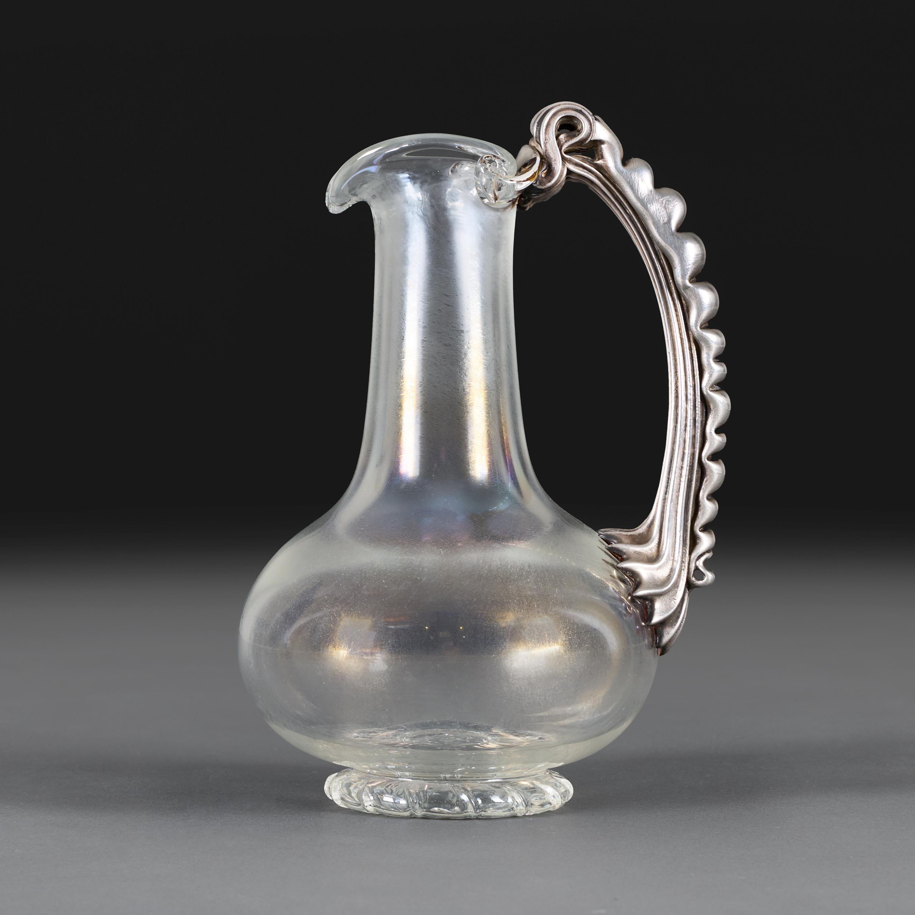 Czech A late 19th Century Iridescent Glass Water Jug with Silver Handle For Sale