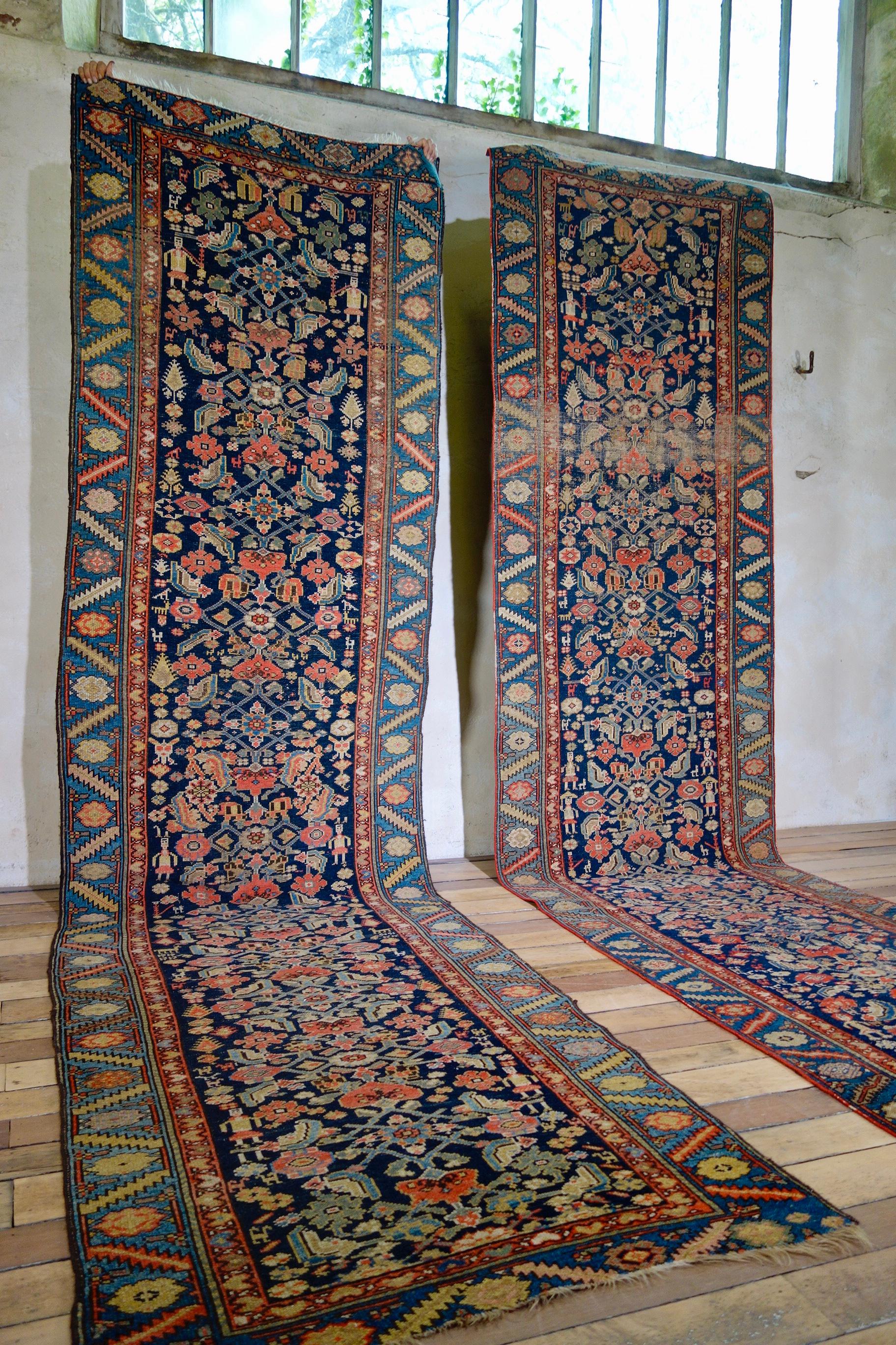 A near pair of late 19th century Persian Malayer carpet runners. Showcasing an intrinsic geometric pattern highlighting the infamous Herati design, this design consists of a lozenge form with floral motifs at the corners, surrounded by lancet-shaped