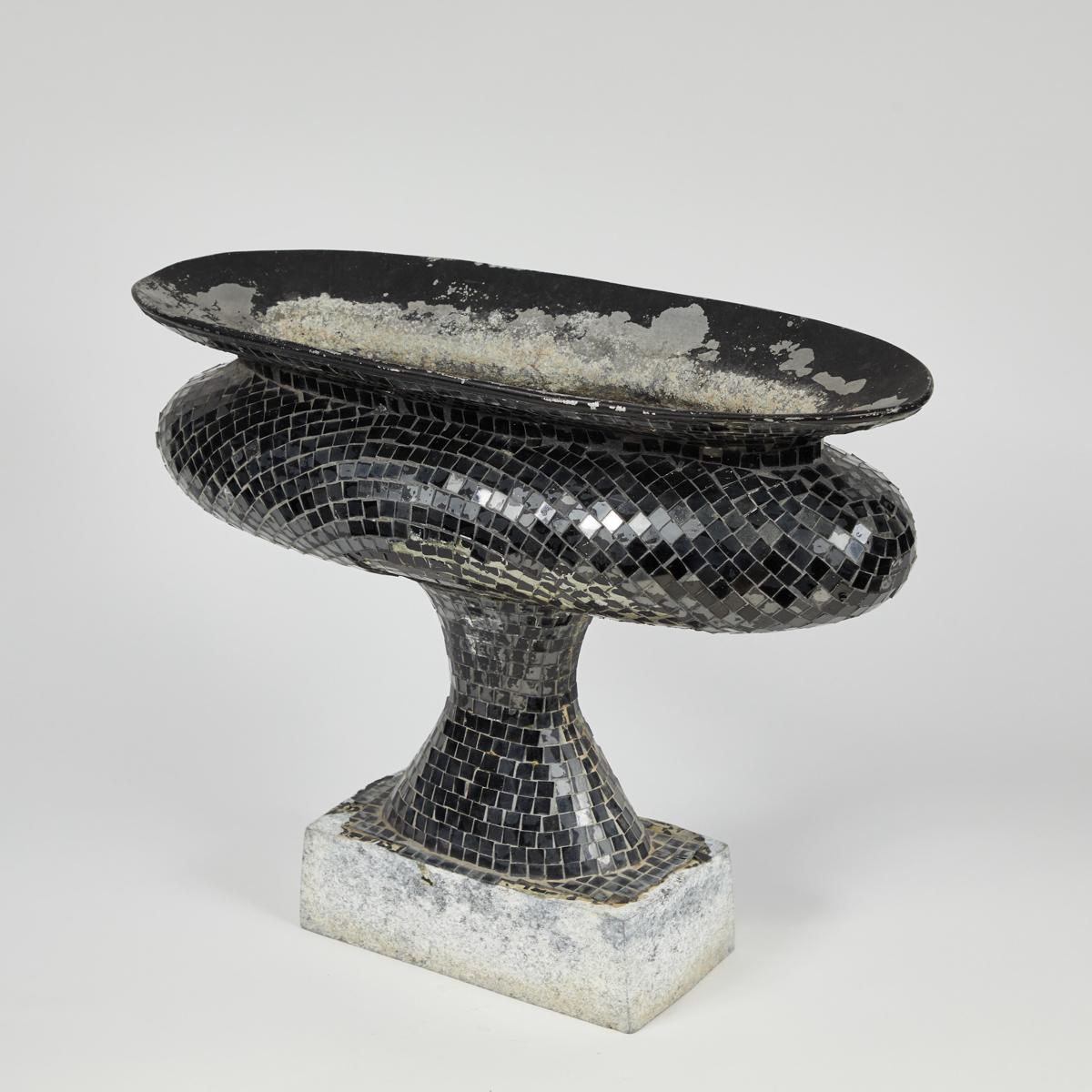 An oblong marble footed urn with glass mosaic decoration on stone base. Originating from France, circa 1880.
