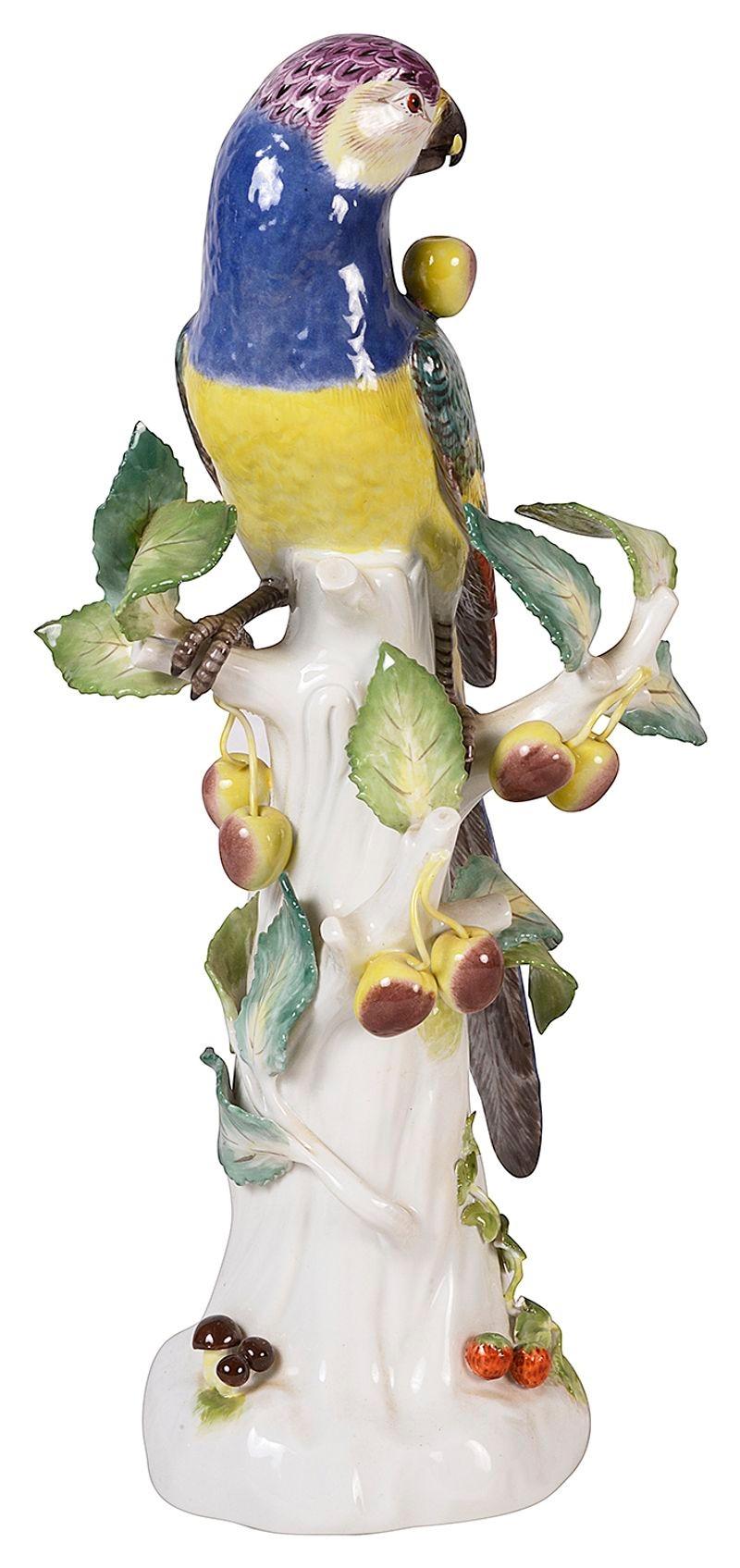 A wonderfully colourful late 19th century Meissen porcelain model of a parrot perched on a cherry tree. 
Signed with Blue crossed swords to the base.
 
Batch 71 61574 LHYN.