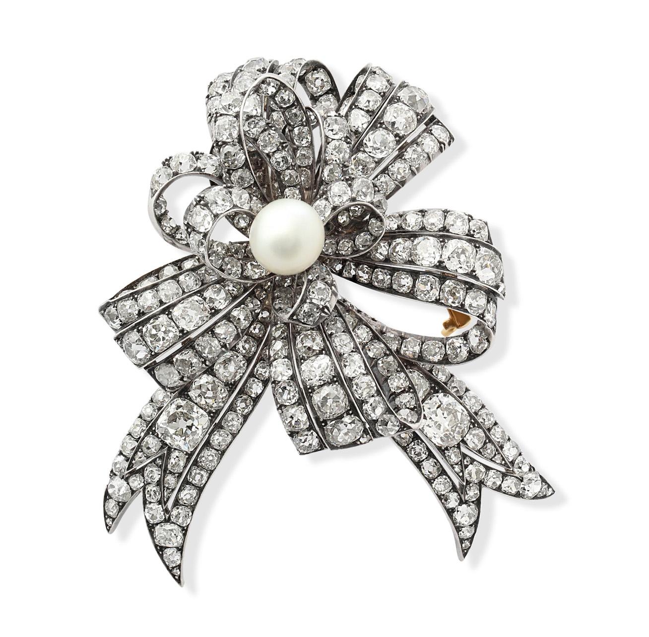 Round Cut Late 19th Century Natural Pearl & Diamond Bow Brooch For Sale