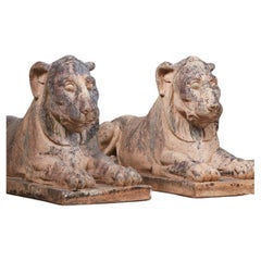 A Late 19th Century Pair of Terracotta Recumbant Lionesses