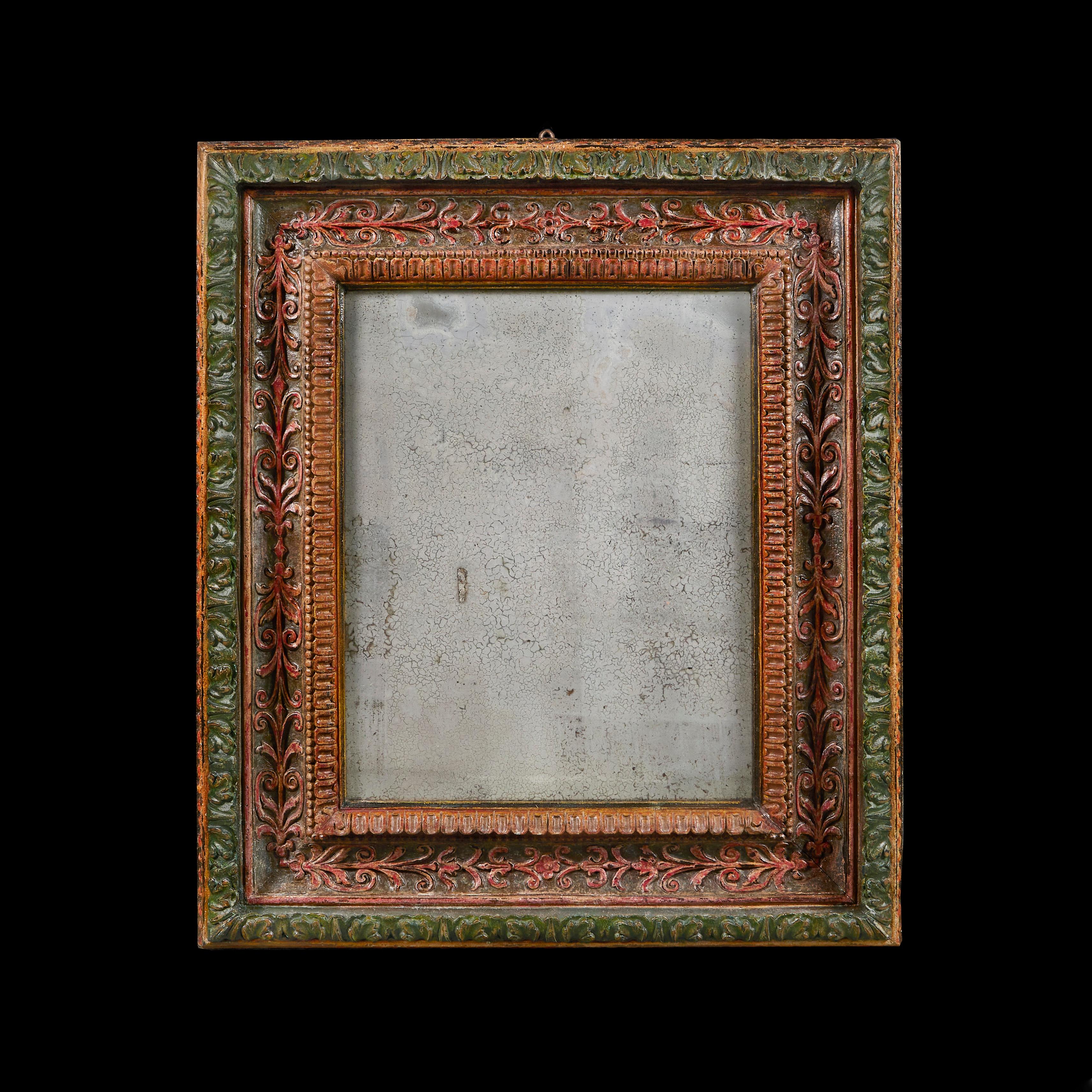 Italy, Rome, circa 1890

An unusual late nineteenth century Roman pier mirror retaining its original paint, the borders decorated with Pompeiian reds and greens, carved throughout with foliate designs.

Height 78.00cm
Width 68.00cm