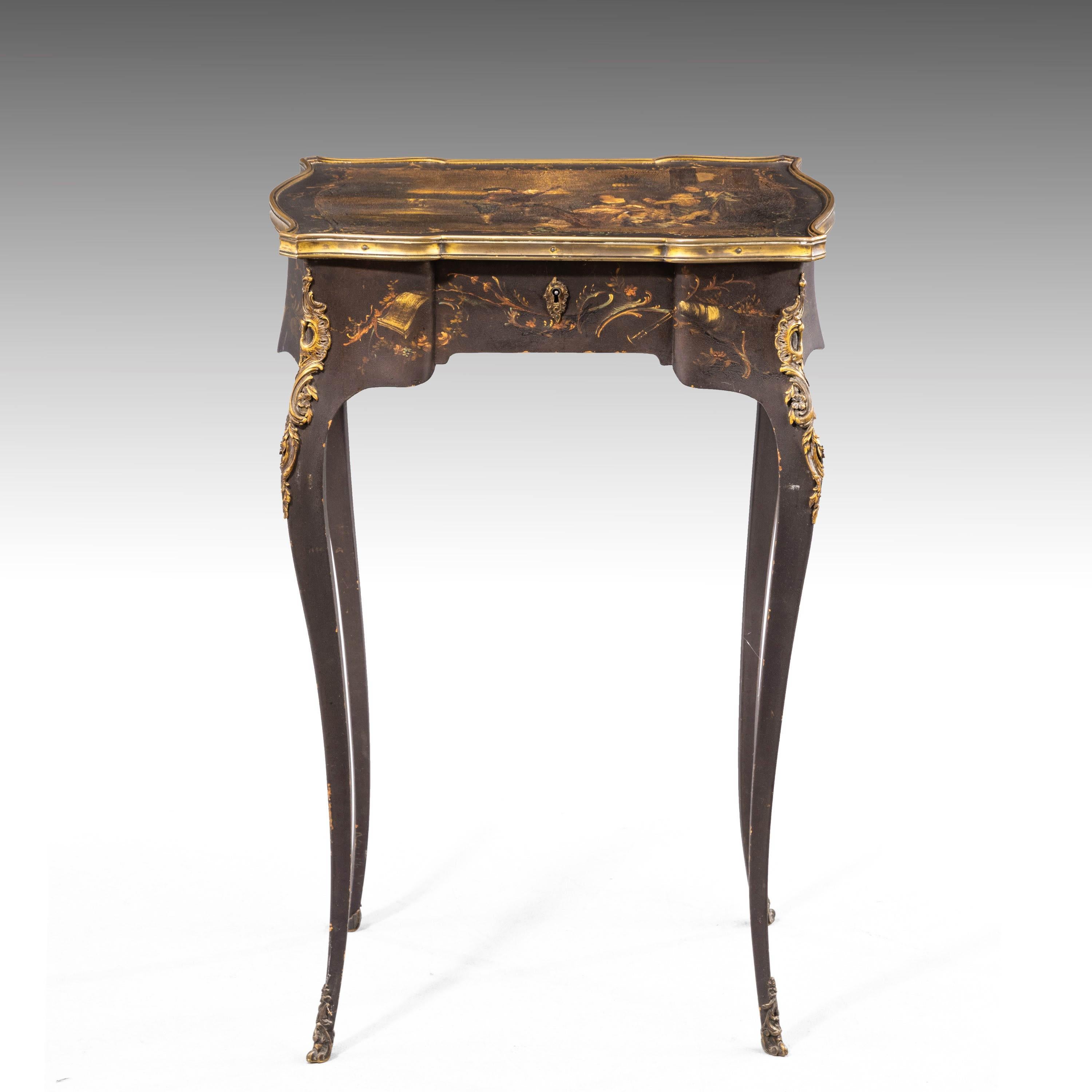 A Vernis Martin French work table. On finely shaped cabriole supports. Retaining the original gilt bronze mounts, now oxidised. The top with a finely painted Watteauesque scene but now heavily oxidised.
 
